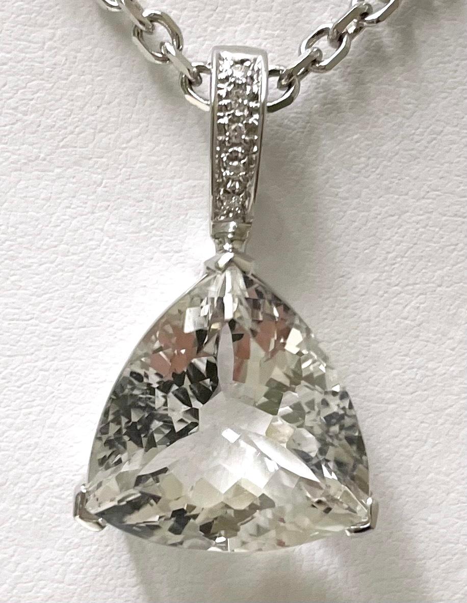 Description
Exquisite White Topaz, trillion shape diamond pendant suspended from a 14k white gold chain. Pendant is removable, but not sold separately.
Item #N3839

Materials and Weight
White topaz, 18mm, trillion shape, 22 carats
Pave diamonds, .05