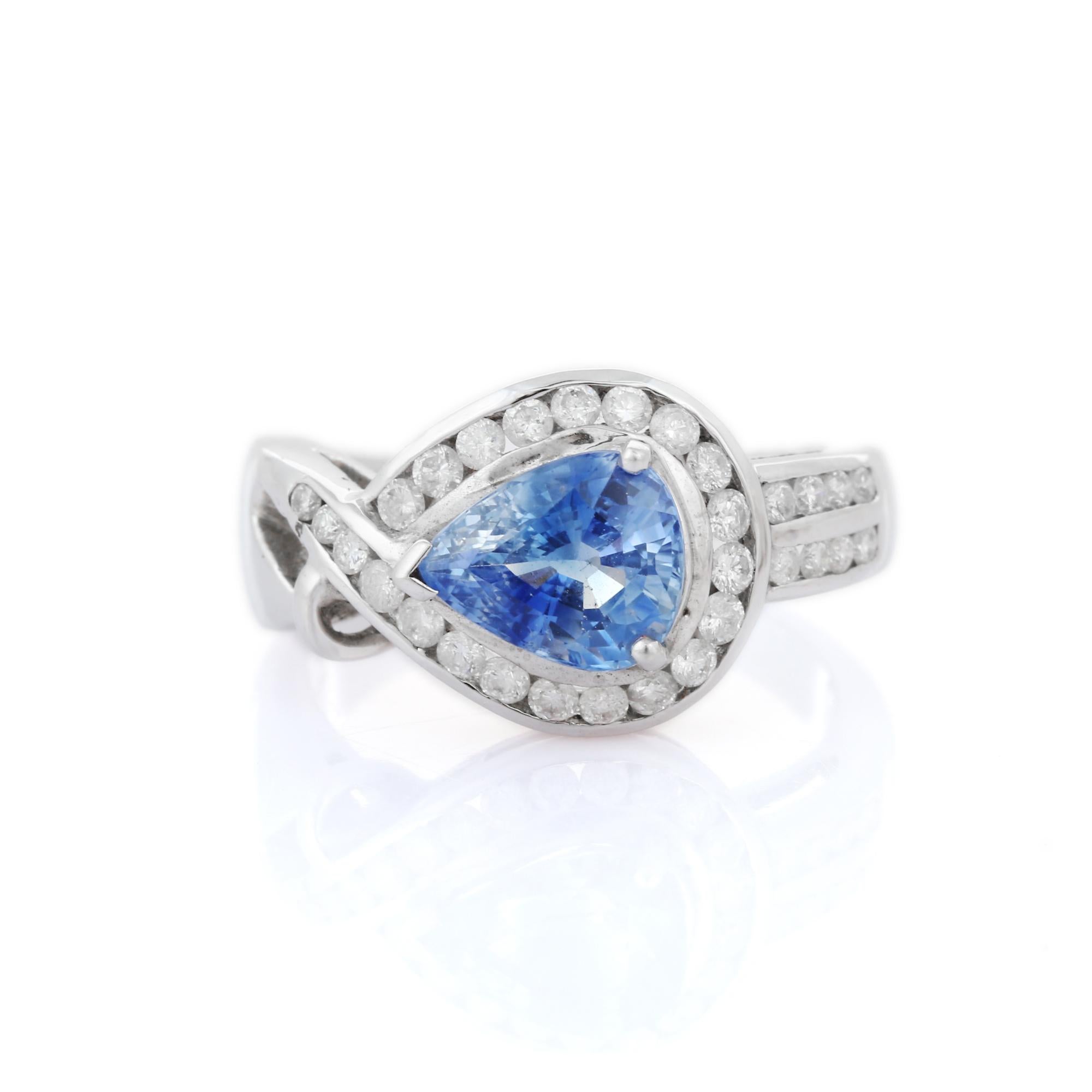 For Sale:  Pear Blue Sapphire and Diamond Wedding Ring Encased in Solid 18k White Gold 2