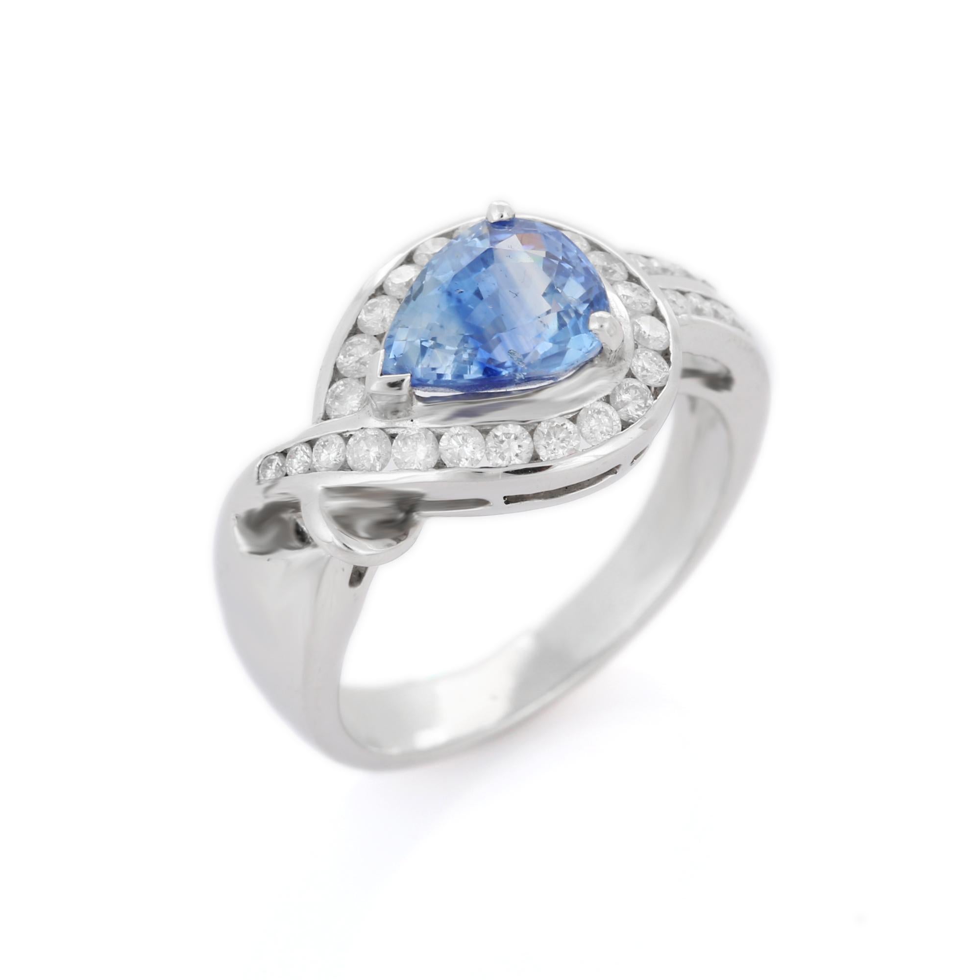 For Sale:  Pear Blue Sapphire and Diamond Wedding Ring Encased in Solid 18k White Gold 5