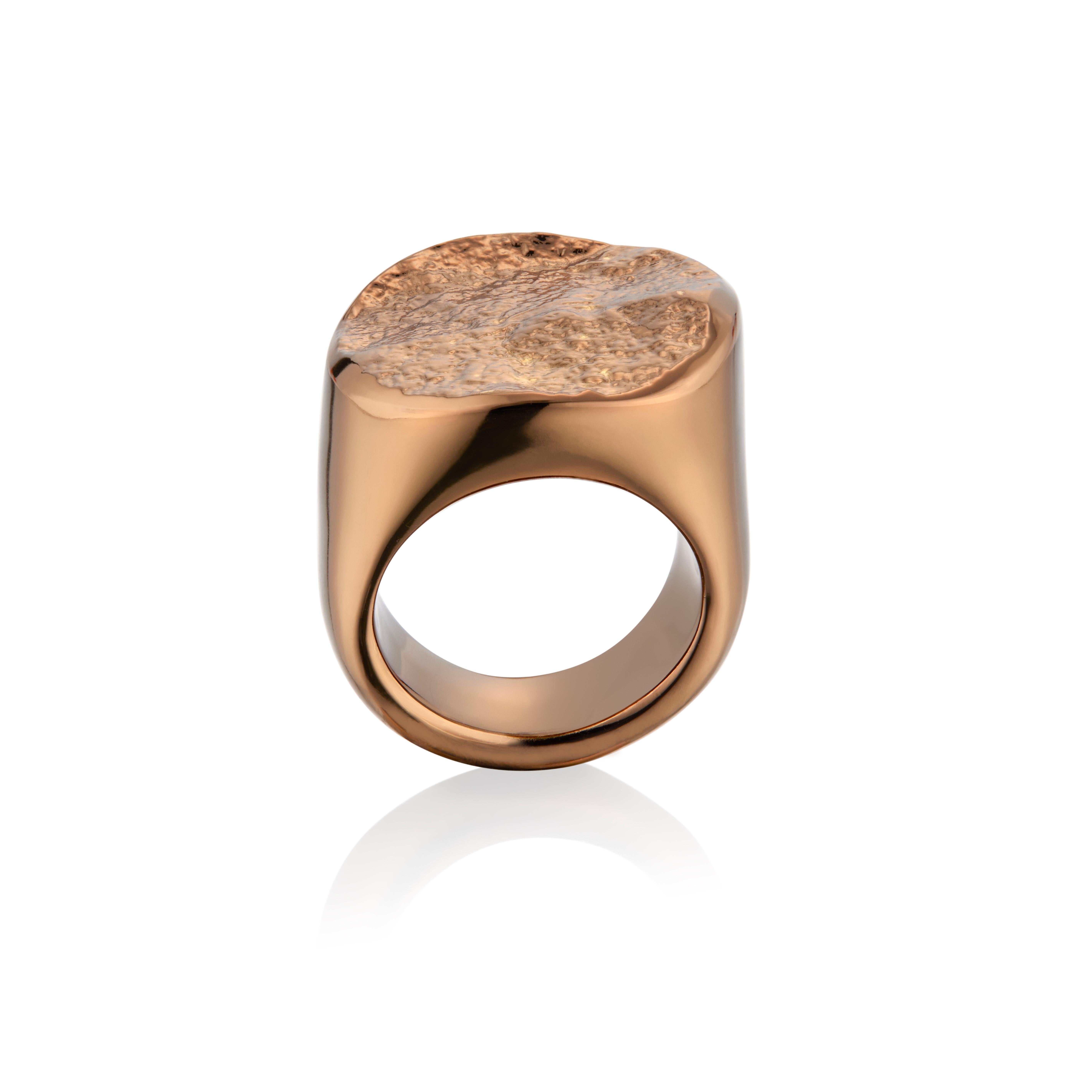 This Signet Ring is like no other with its smooth high polished bottom and the contrast of a spongy textured top, making it a beautiful statement piece for anyone.

This piece is a part of our chocolate gold collection

Size 7- Ring Size is