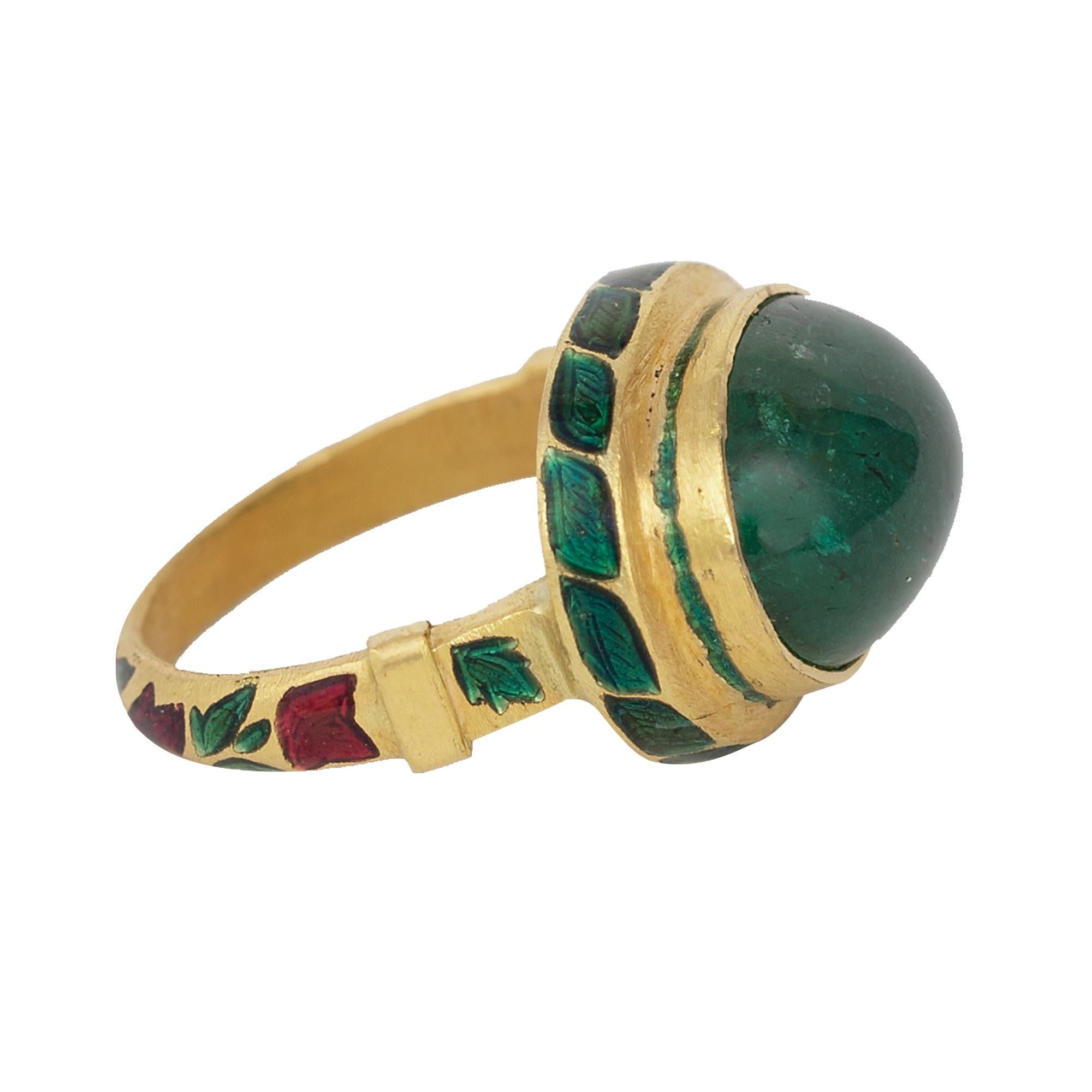 22 Karat Gold 7.13 Carat Natural Emerald Cabochon Ring with Enamel Work

This majestic Mughal era style hand-made forest green emerald cabochon ring with green and red enamel is marvelous. The oval shaped emerald cabochon is set in a long gold bezel