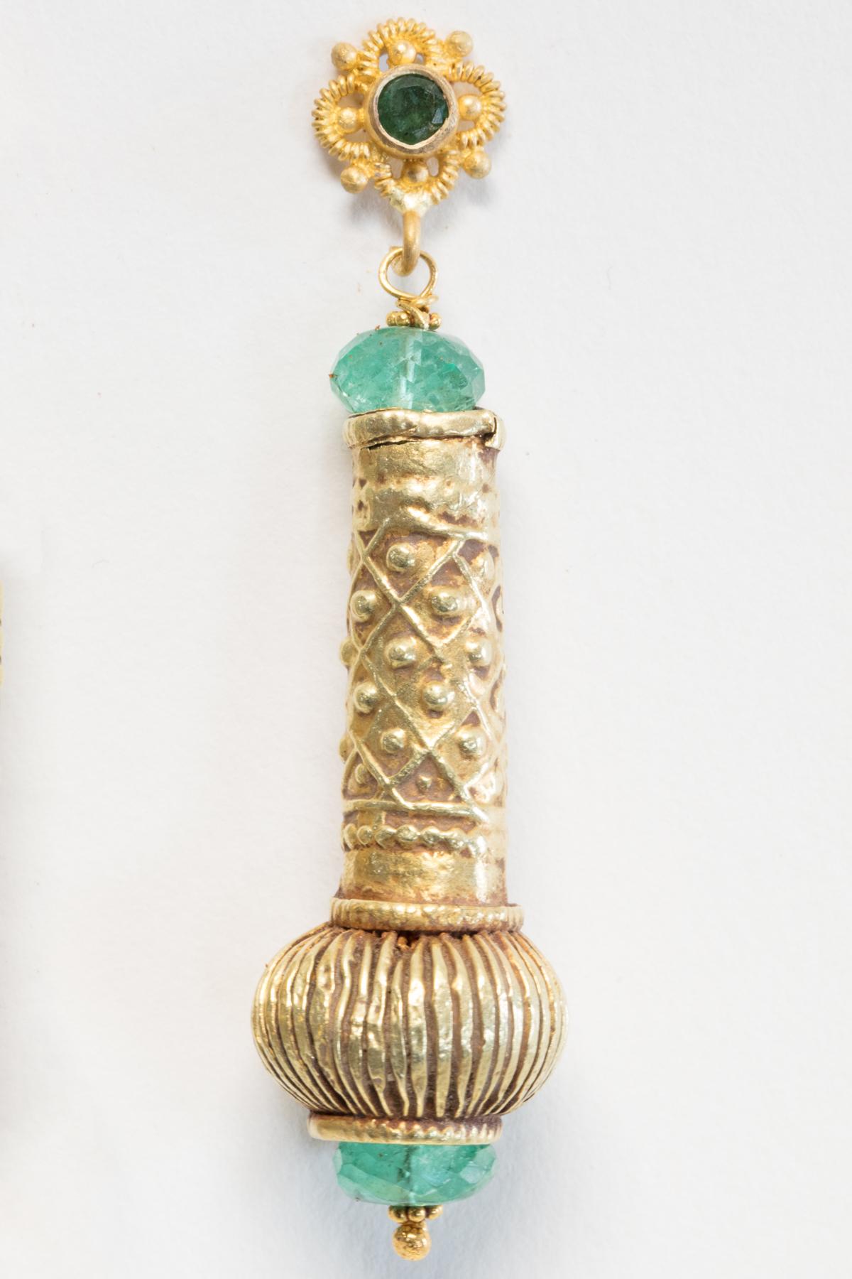 Faceted Colombian Emeralds adorn these fabulous 22K gold Indian tubular bead with hand-tooling and granulation work (originally from an old necklace).  22K gold post also with an emerald center.  Mid 1900's.  By Deborah Lockhart Phillips