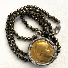 22 Karat Gold Coin in Platinum Frame on Pyrite Chain
