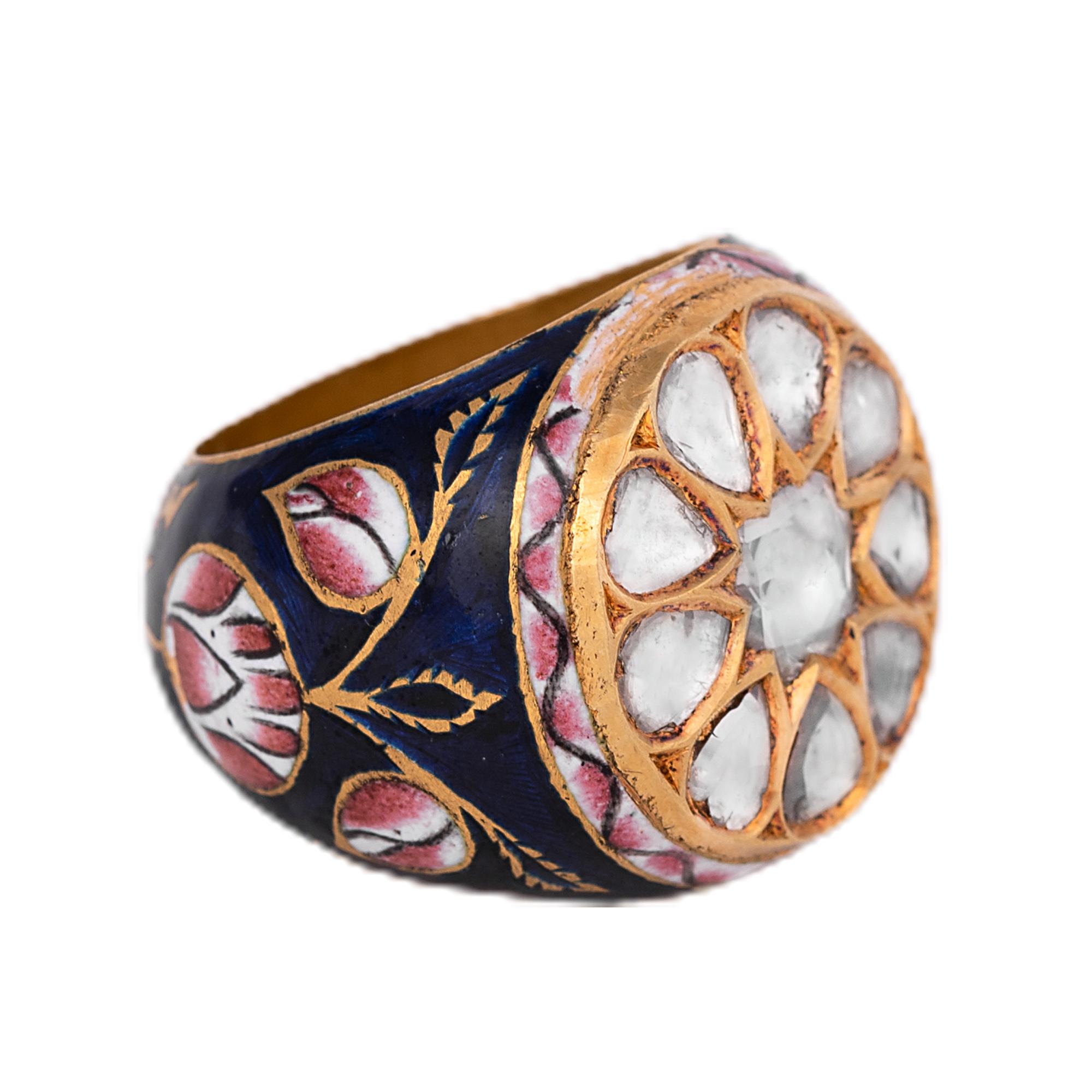 22 Karat Gold Diamond Cluster Ring with Blue, Red, and White Enamel Work 

This incredulous Mughal era style hand-made polki diamond ring with blue, red and white enamel is impressive. The uneven pear cut flat polki diamond solitaires set in gold