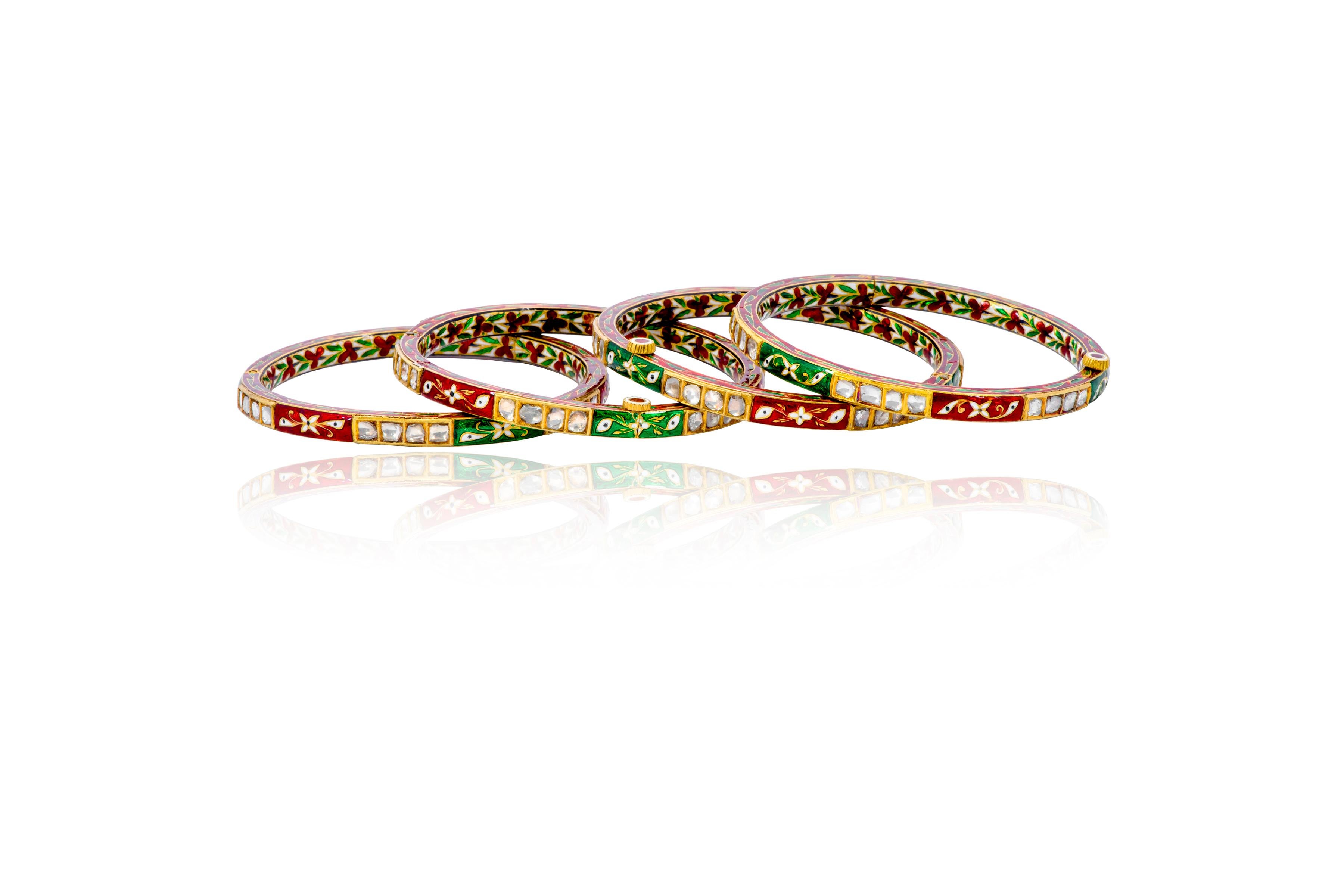 22 Karat Gold Diamond Four Tennis Bangle Bracelets with Colorful Enamel Work

This exemplary Mughal era style hand-made Polki diamond single line bangle with colorful enamel is eternal. The bangle design is the typical “churi” style with solitaire