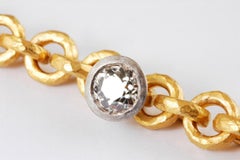 22 Karat Gold Hammered Link Bracelet with Platinum Set Old Cut Diamond 0.72cts