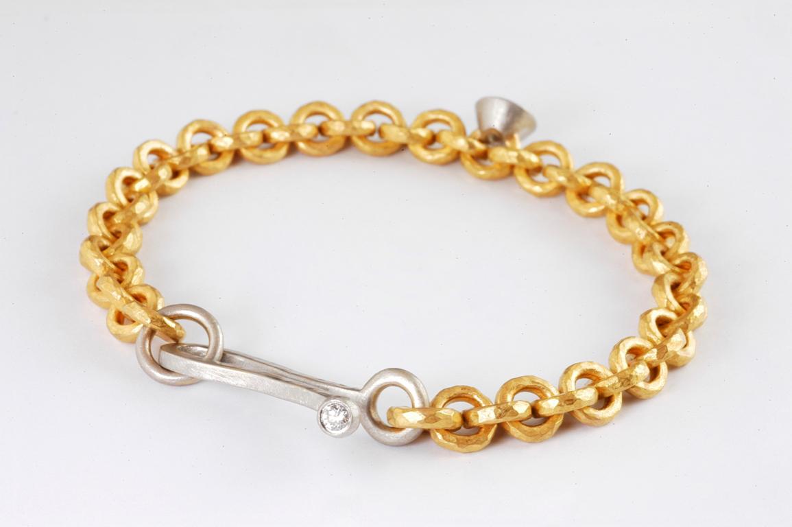 Contemporary 22 Karat Gold Hammered Link Bracelet with Platinum Set Old Cut Diamond 0.72cts For Sale