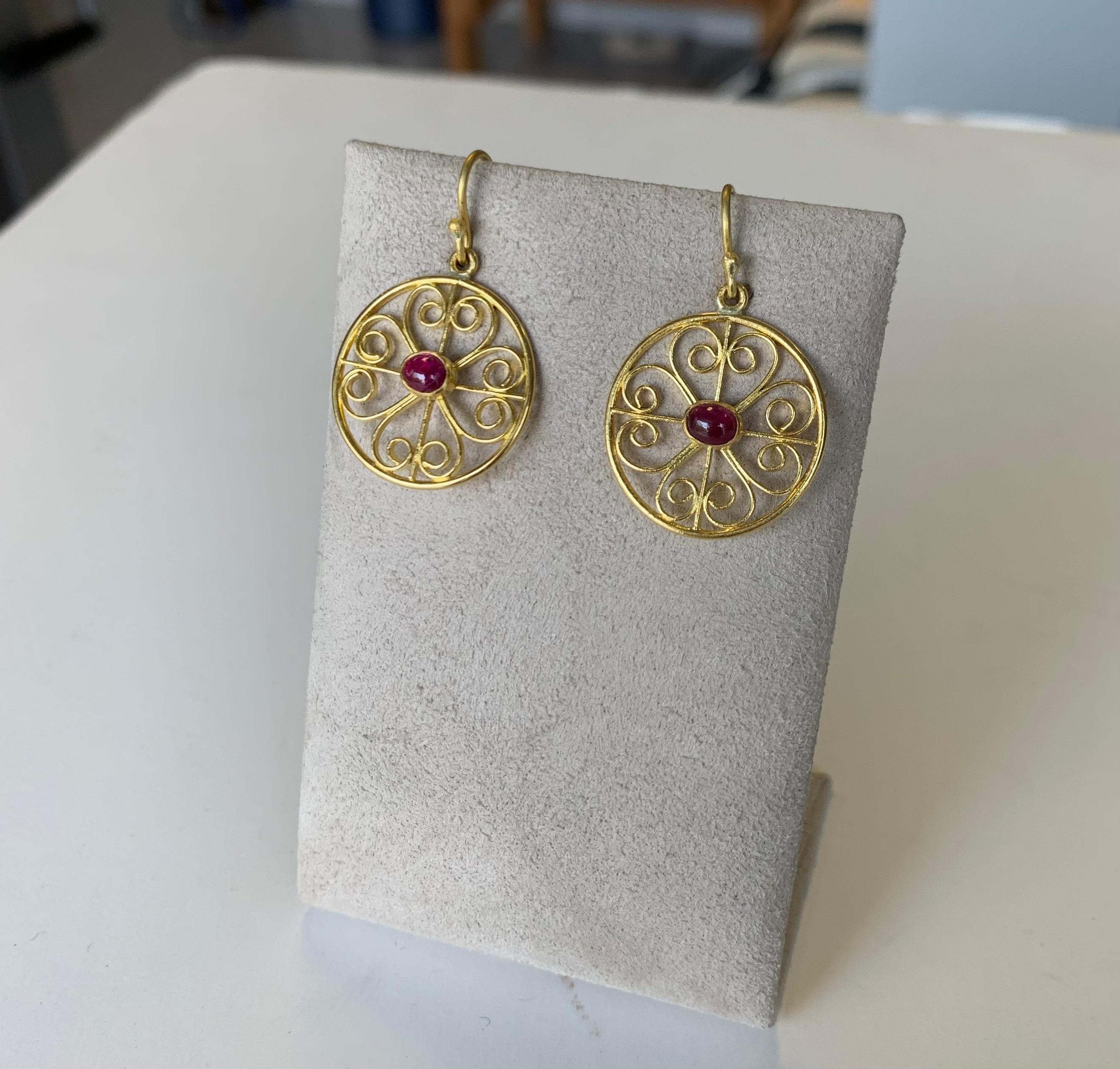 Roman filigree earrings in 22 Karat gold with natural oval Ruby cabochons  4x5 millimeter 1.5 carats 
Rubies are one of the 4 cardinal precious gemstones and have been appreciated for millennia, in HIndu lore the belief is that worshiping and