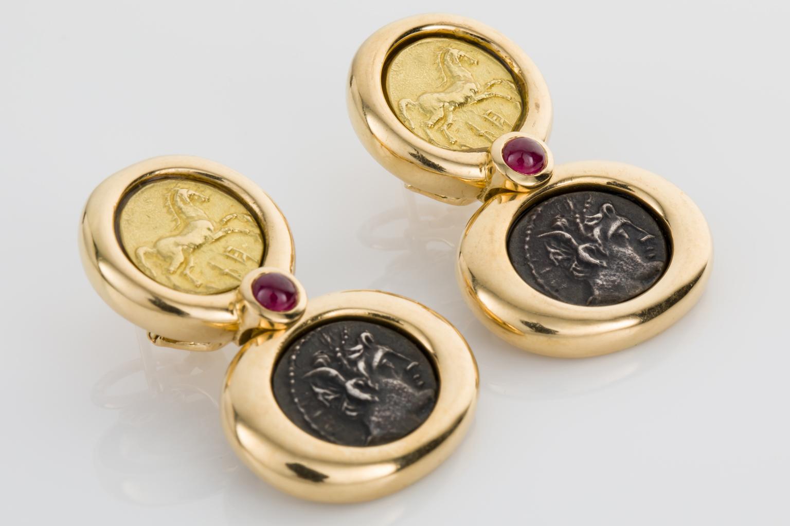 Wow look at these amazing earrings! Featuring French coins as the centrepieces, they are crafted from 22k & 18k yellow gold and silver. Depicting horses on the top 22k yellow gold coins and a mythical warrior on the lower silver coins, these are all