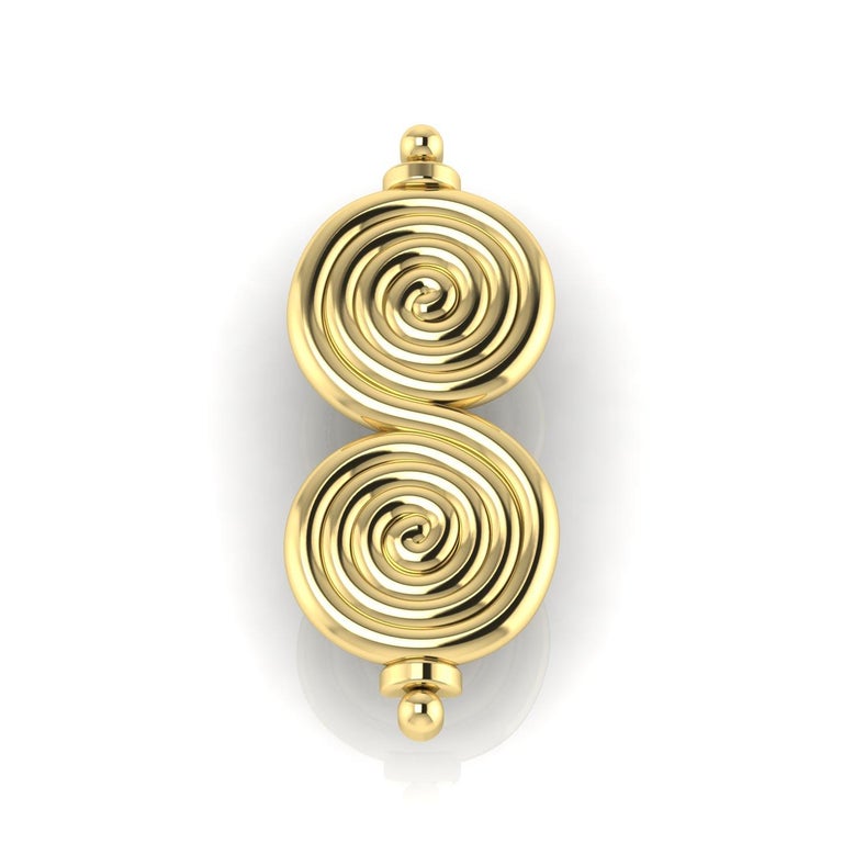 22 Karat Yellow Gold Spiral Brooch by Romae Jewelry Inspired by Ancient Designs. Our gorgeous Karpathia brooch features the iconic spiral motif that was so influential in ancient Minoan and Mycenaean art. Believed to represent waves, the theme is
