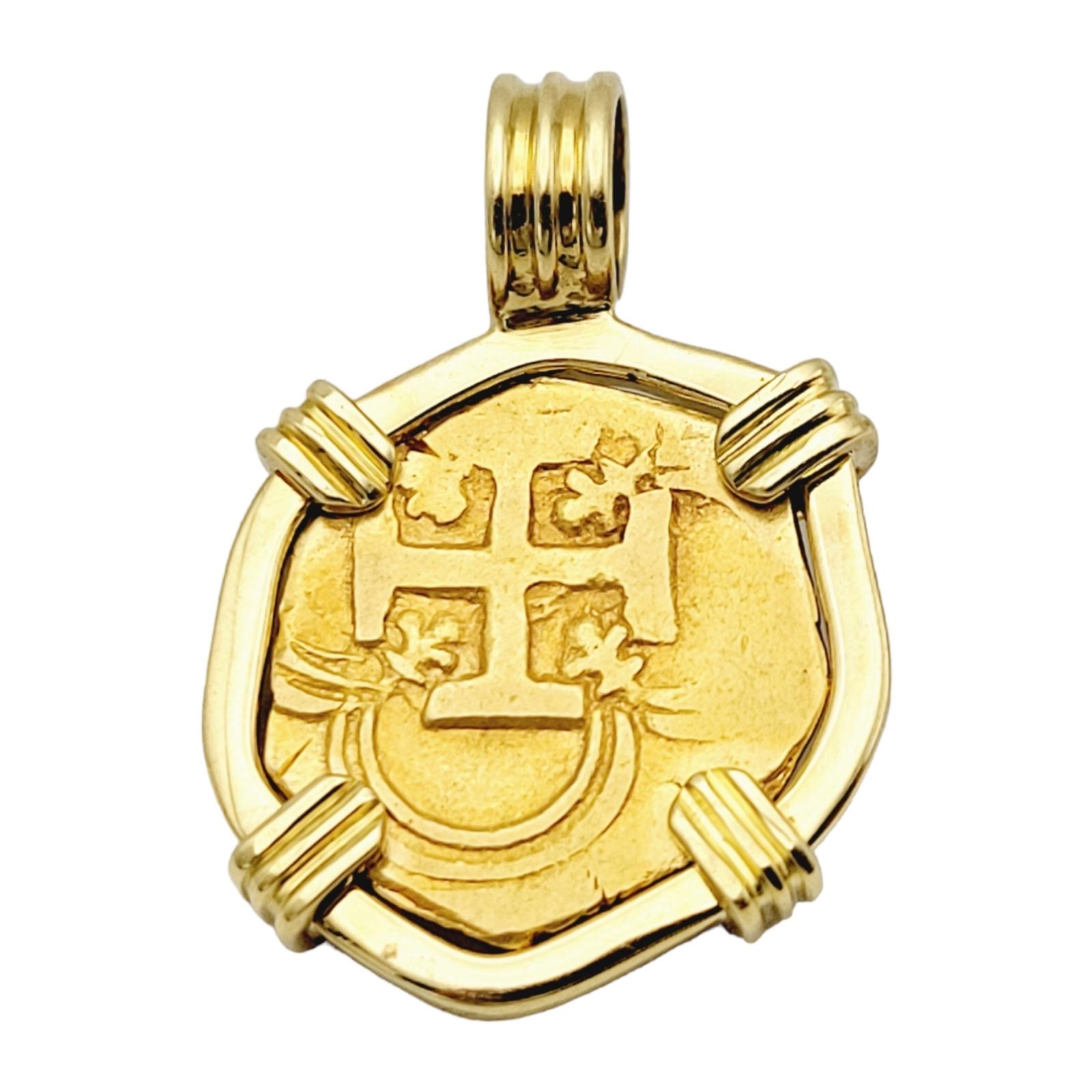 Incredible 22-karat Spanish 2 Escudos treasure coin set in a polished 18 karat yellow gold bezel setting. The impressive coin was created during the 1600s with some details still visible! 

This pendant features a single Spanish 2 Escudos 22-karat