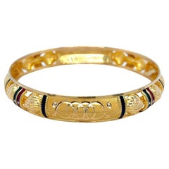 Bracelet en or jaune 22 carats et émail