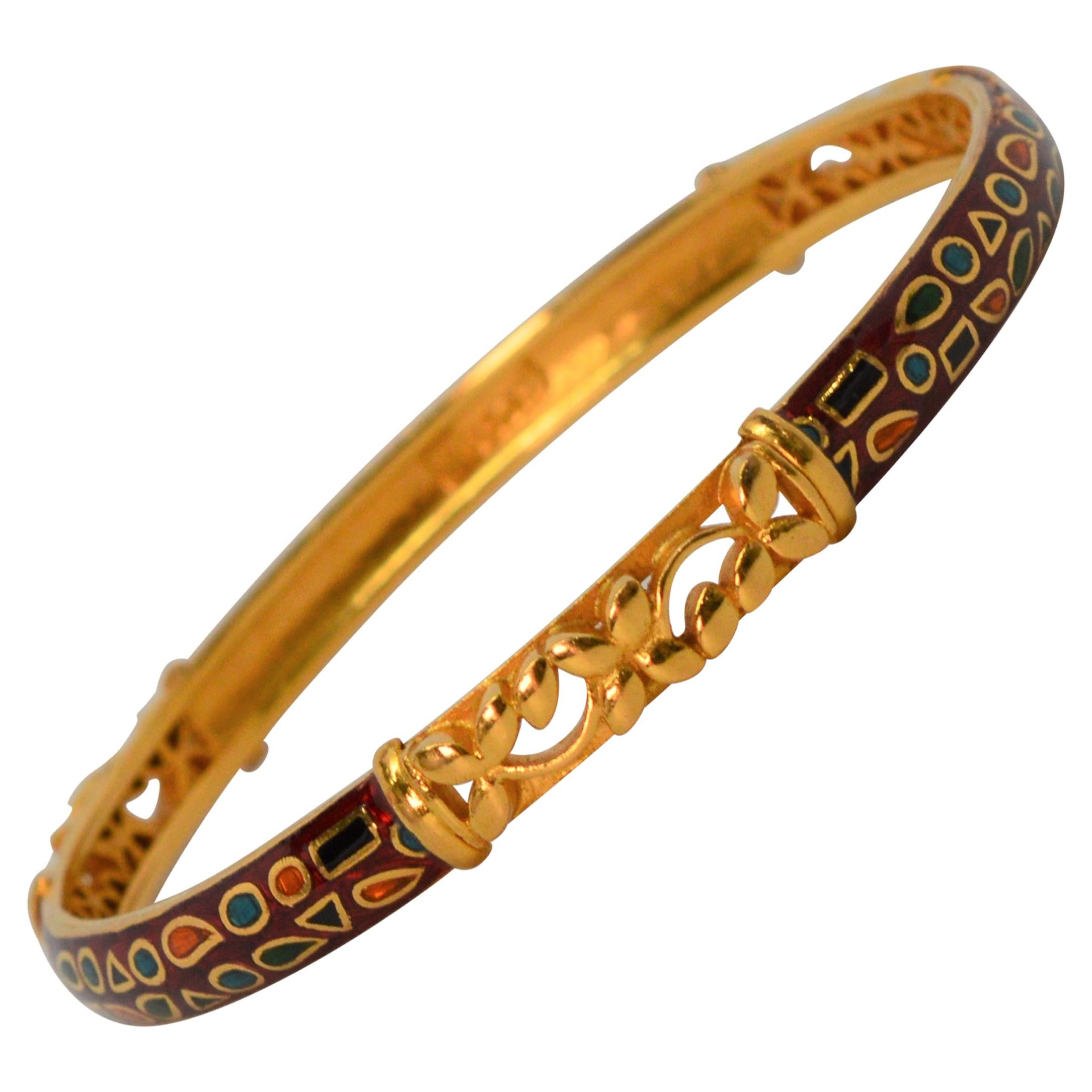 Bracelet artisanal en or jaune 22 carats et émail rouge