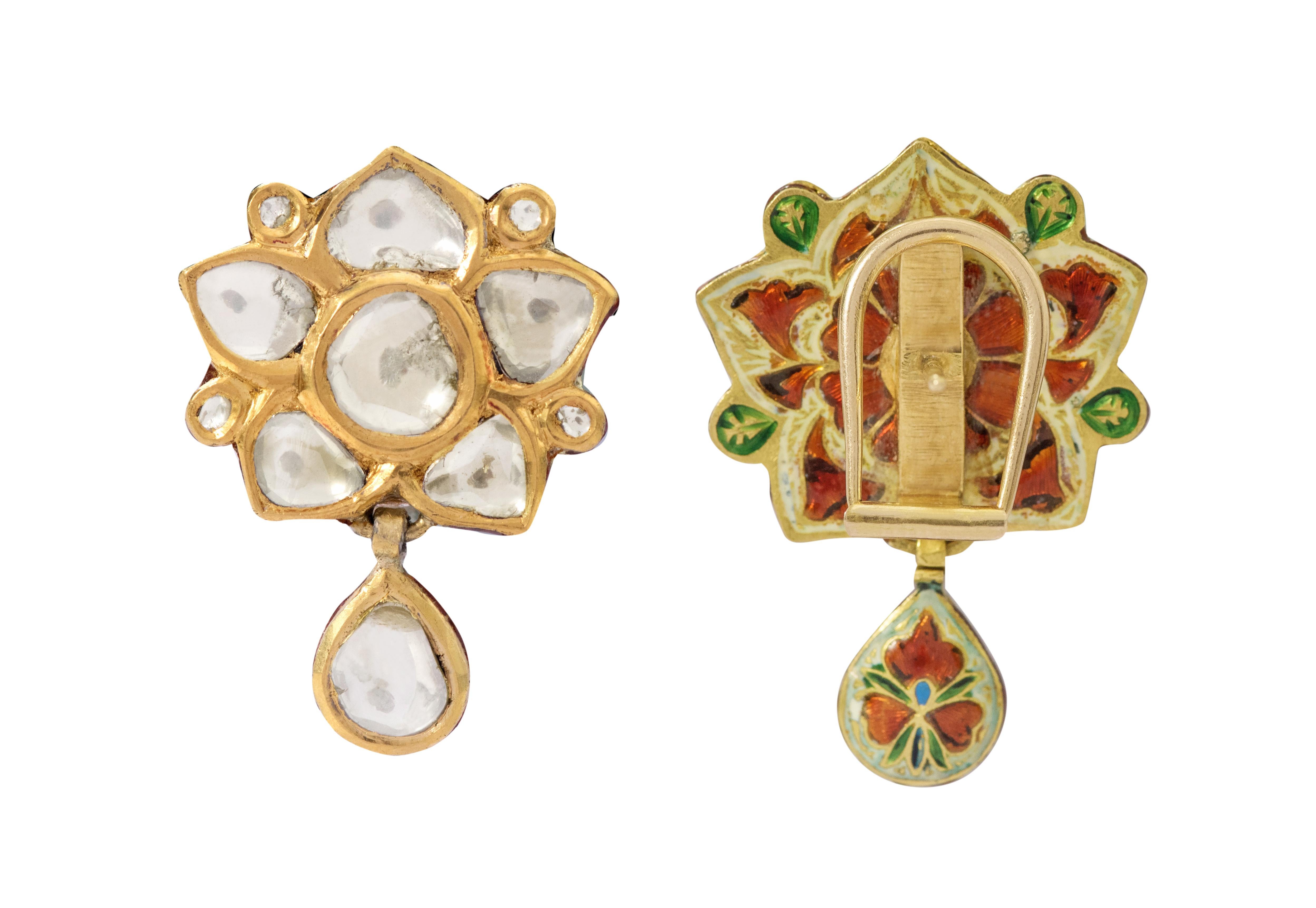 22 Karat Yellow Gold Diamond Stud Earring Handcrafted with Multi-Color Enamel Work

This royal Mughal era hand-made floral polki diamond earring is alluring. The top part of the earring is formed of special broad and long pear shape flat polki