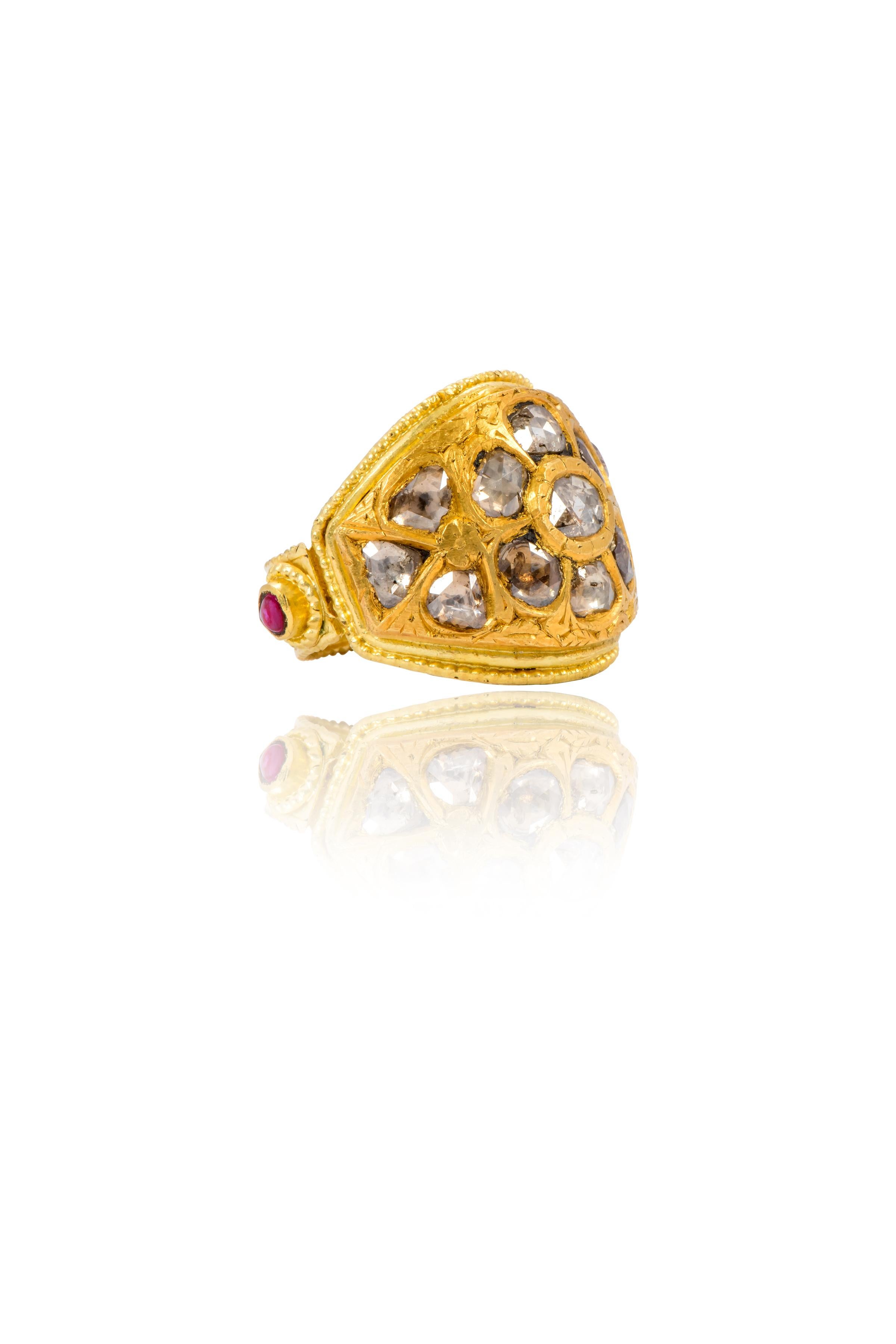 22 Karat Yellow Gold Dome-Shape Diamond and Ruby Statement Ring Handcrafted 

The polki flat cut diamond 22k gold ring handcrafted with sophisticated gold work on the edges and around give it a unique new perspective as a traditional ring. It‘s