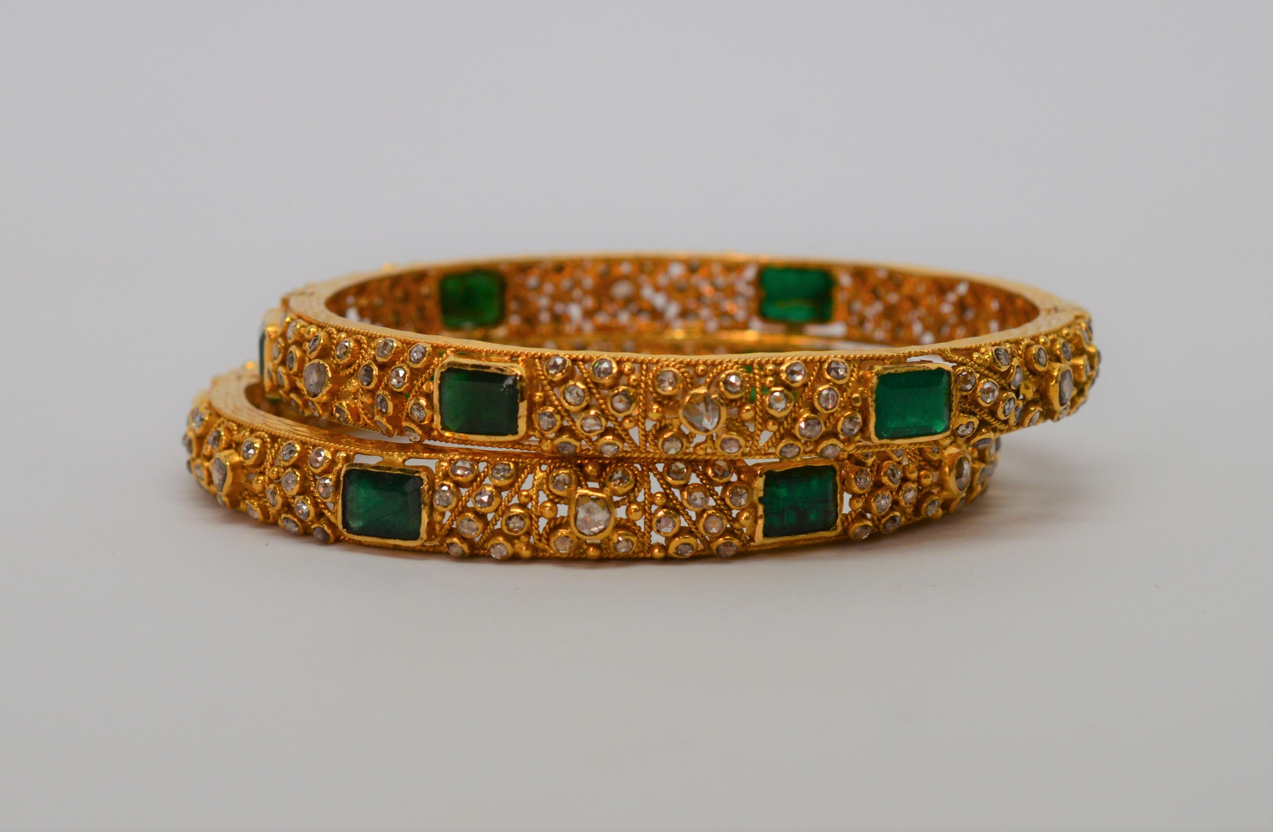 gold bangle with emerald