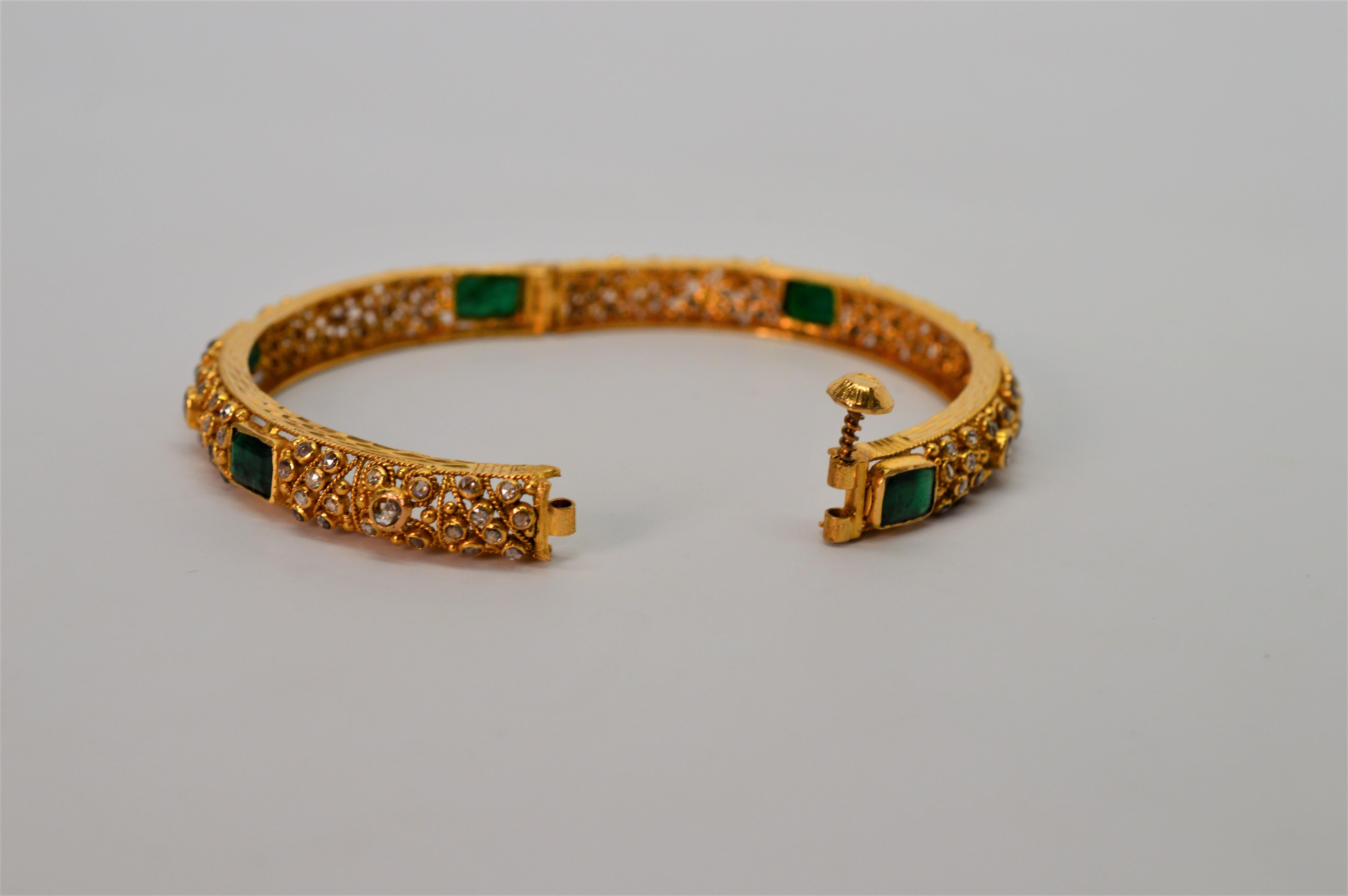 22 Karat Yellow Gold, Emerald and Diamond Bangle Bracelet Pair In Excellent Condition In Mount Kisco, NY
