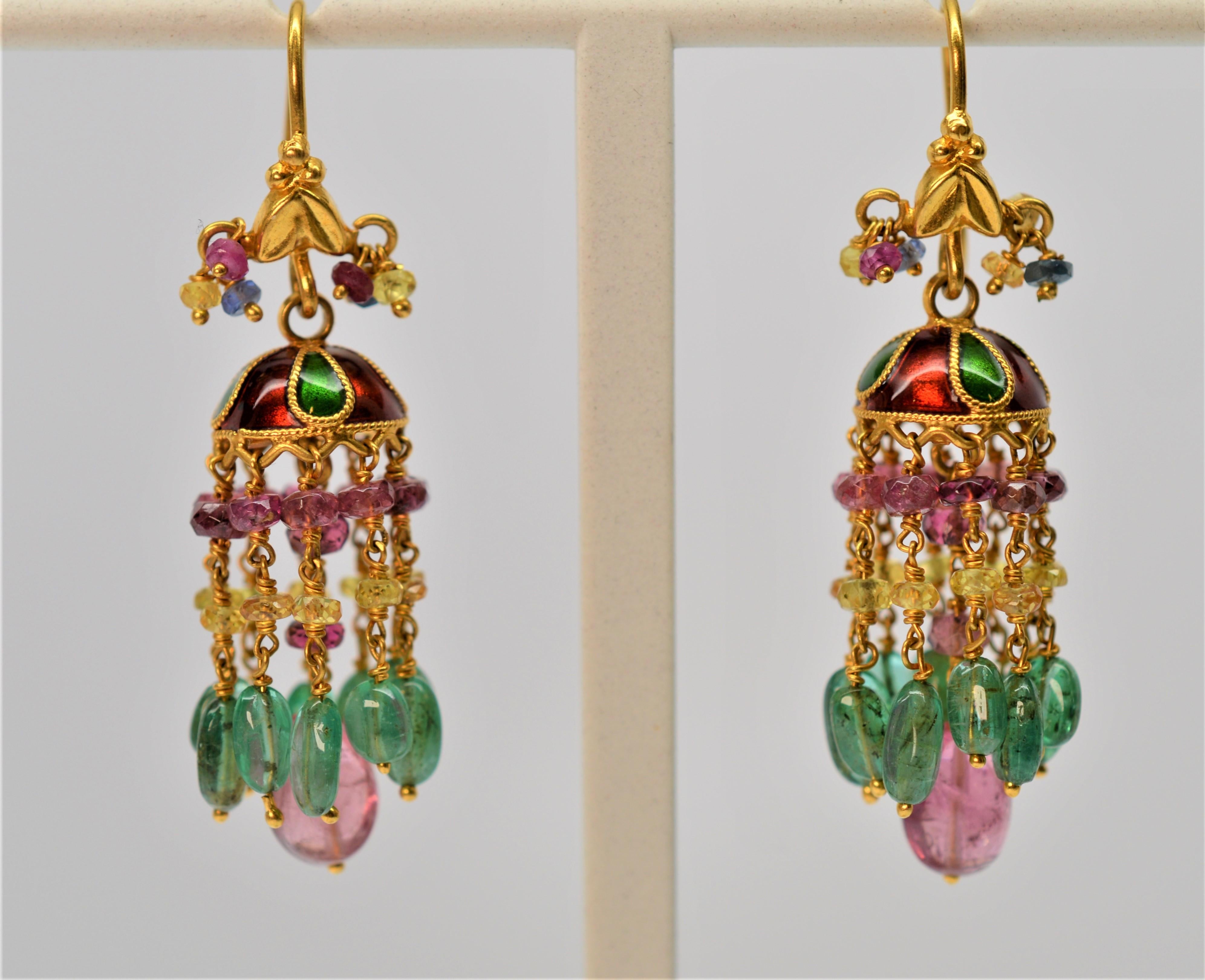 Dramatic 22K Yellow Gold, Emerald & Ruby Earrings with Enamel Accents. Crafted on the Sub-Continent of India in the 20th Century, this unique pair of dangle Earrings is designed with hand-applied enamel in a rich red and lush green color