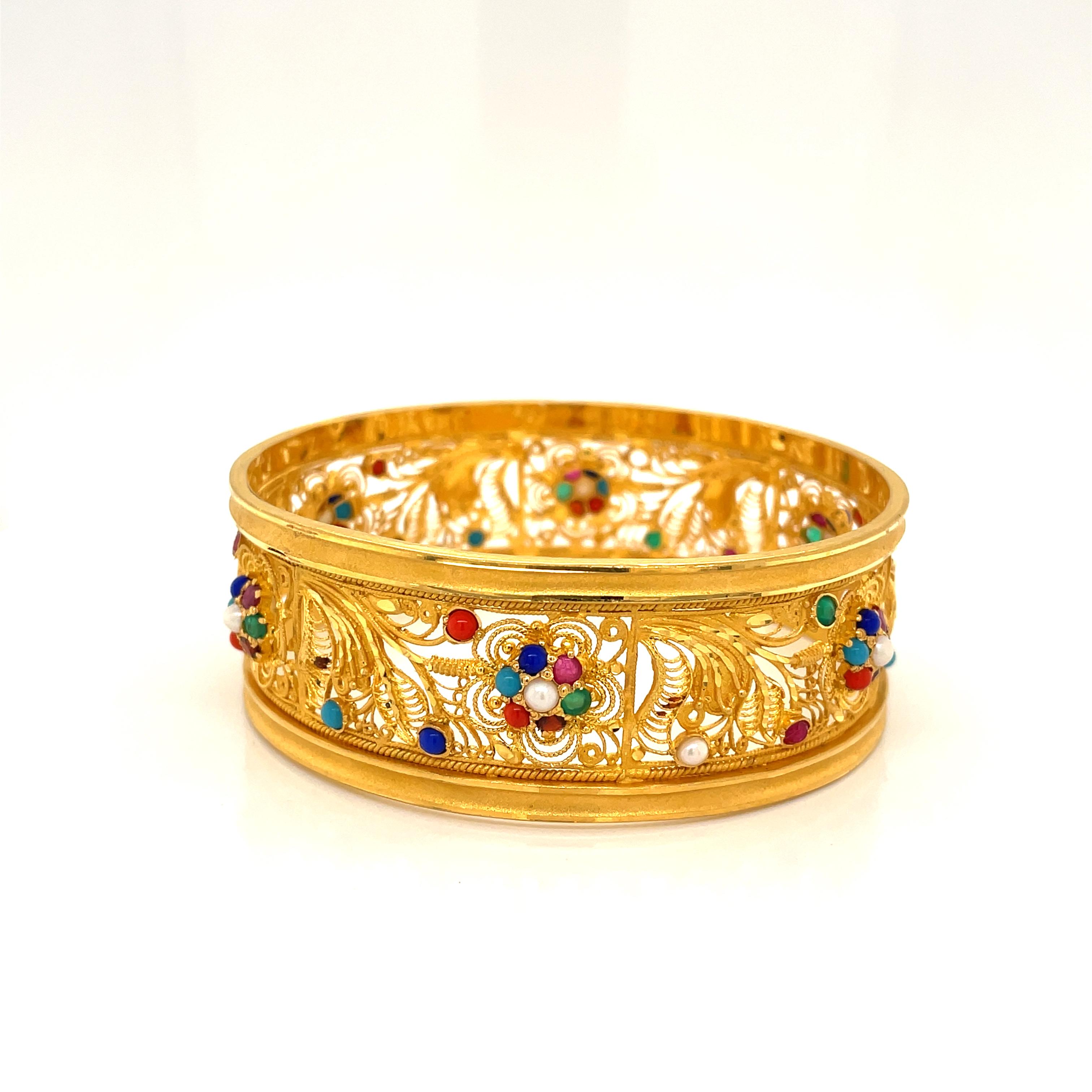 gold bracelet with gems