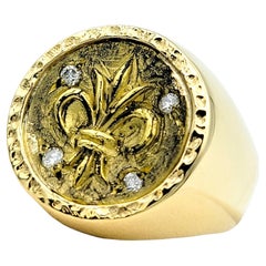 22 Karat Yellow Gold Fleur de Lis Signet Ring with Diamond Accents