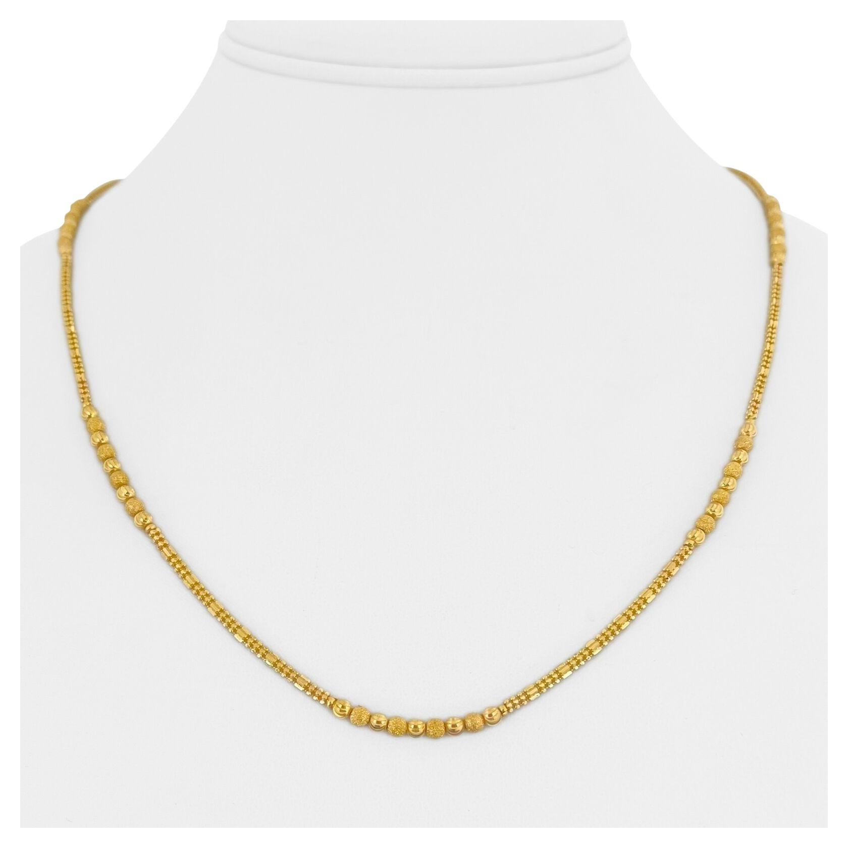 14 Karat Yellow and White Gold Two Tone Twisted Ball Bead Necklace