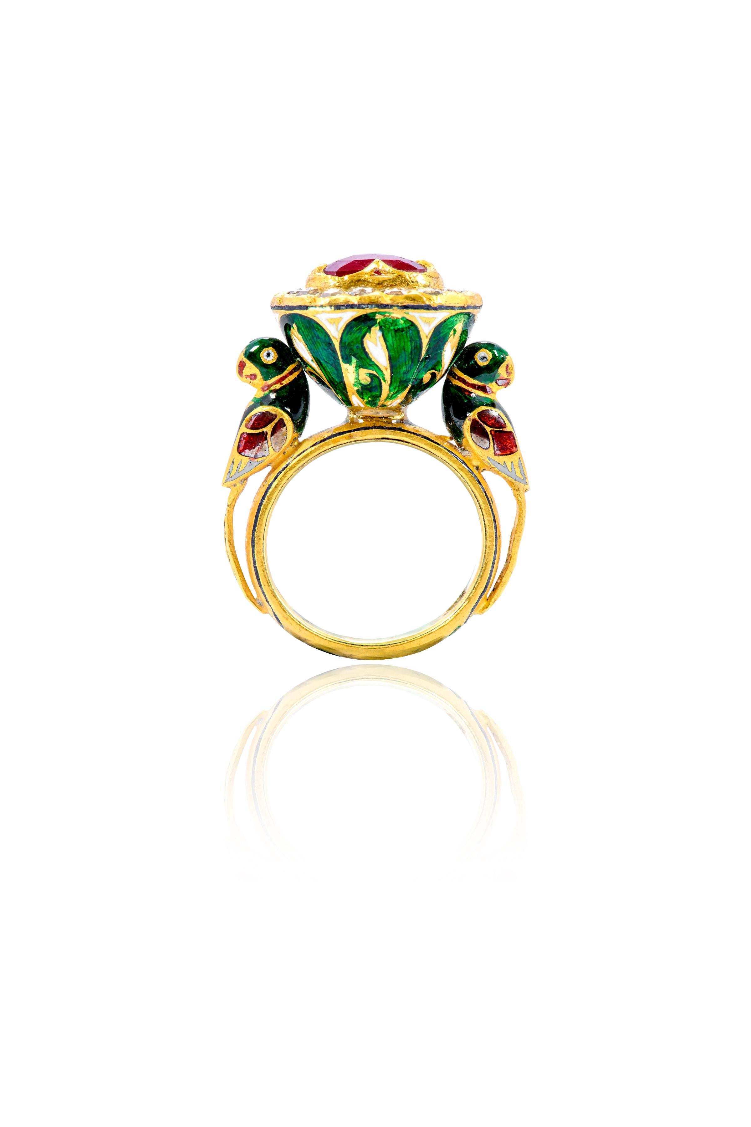  22 Karat Yellow Gold Ruby and Diamond Statement Bird Ring Handcrafted

It’s not easy to define in words the skillfulness encapsulated in the handcrafted design of the ring by our experienced artisans. Inspired from the old Mughal era in India of