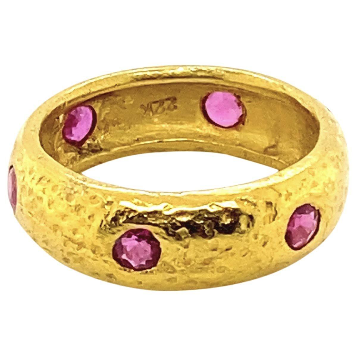 A fabulous set of 22 karat gold rings, hammer set with sapphires & rubies. These rings are stylish and heavy, look so good together or separately. There is a lot of versatility as you can mix and match them with other jewels in your collection, the
