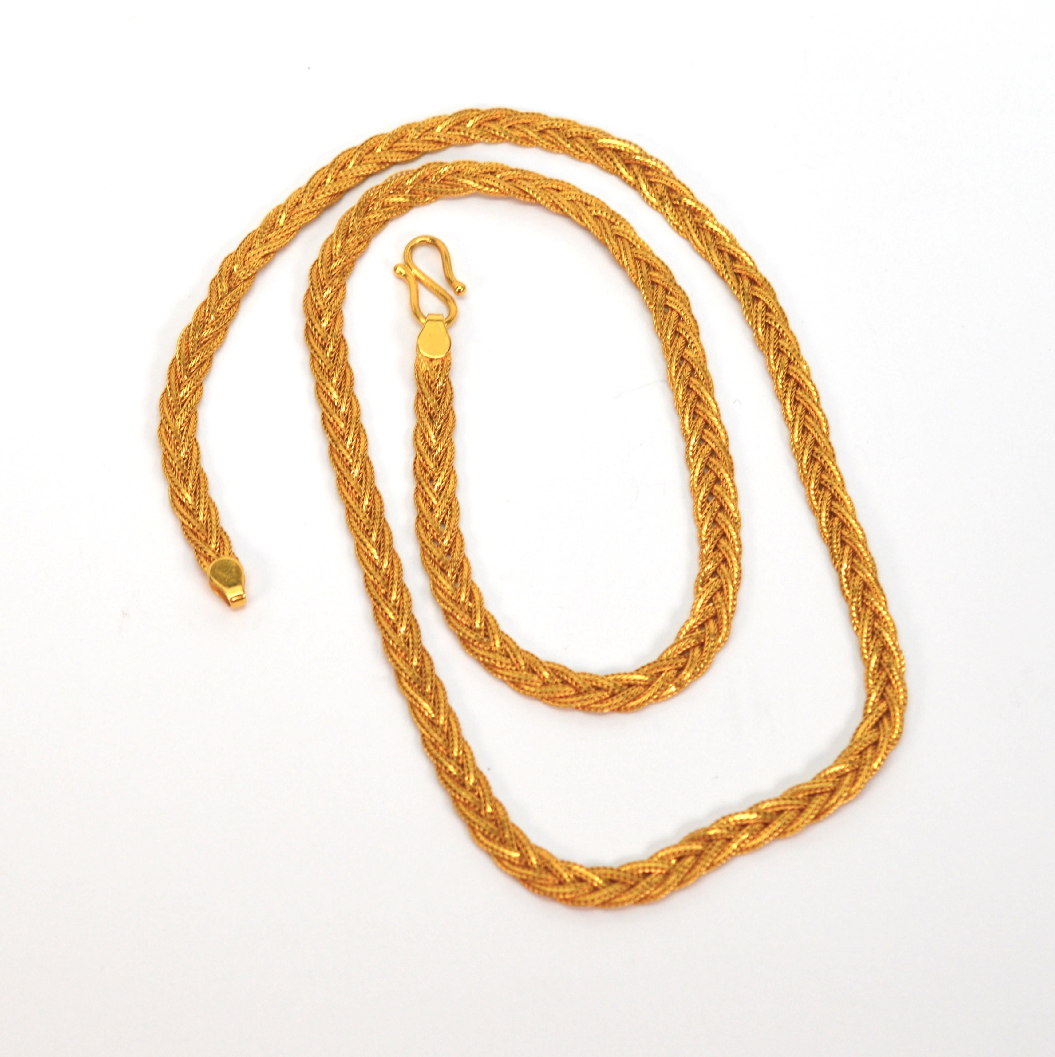 In rich 22 karat yellow gold, 5mm wide gold is woven to create this spectacular 24