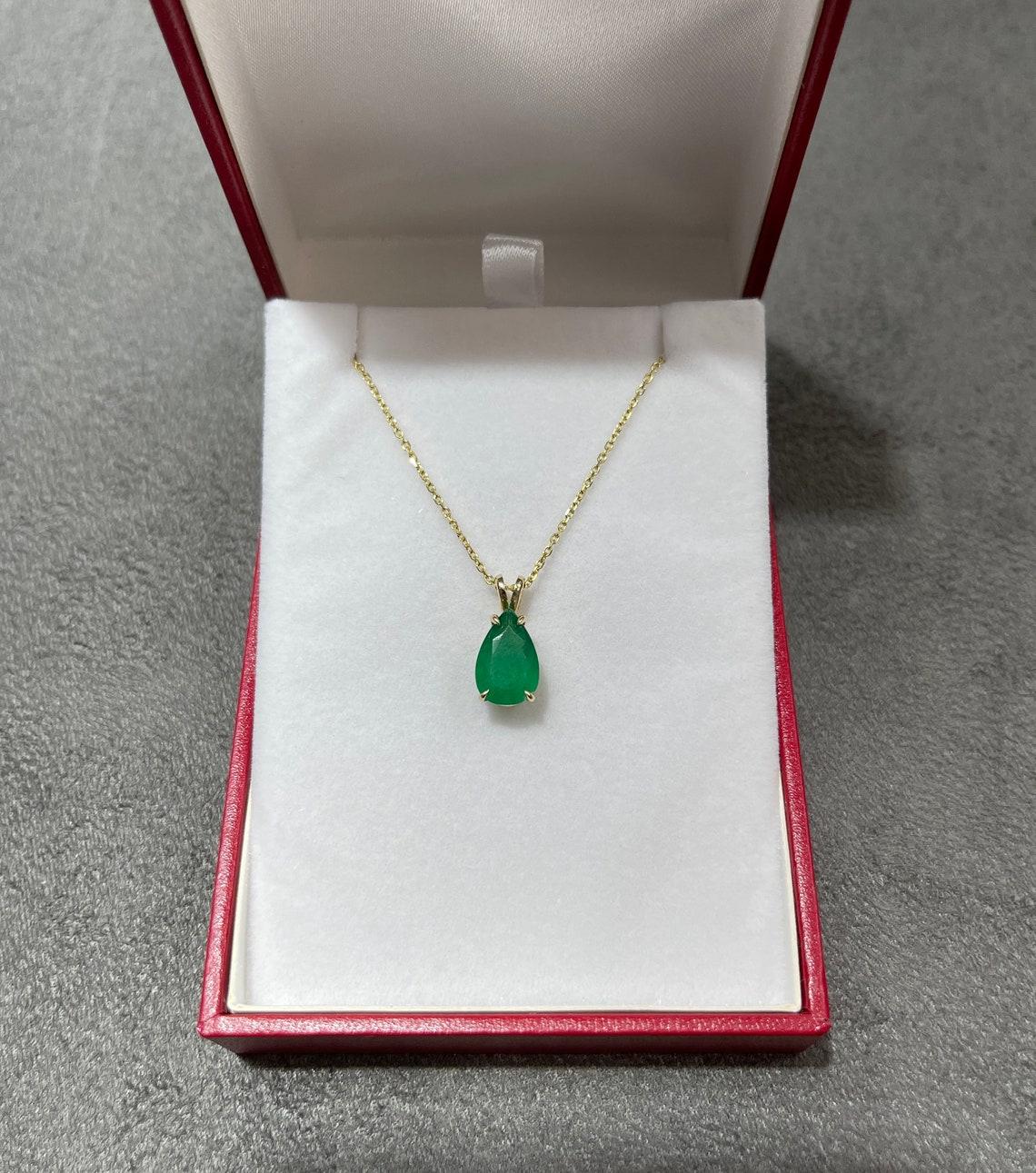 gold emerald pendant