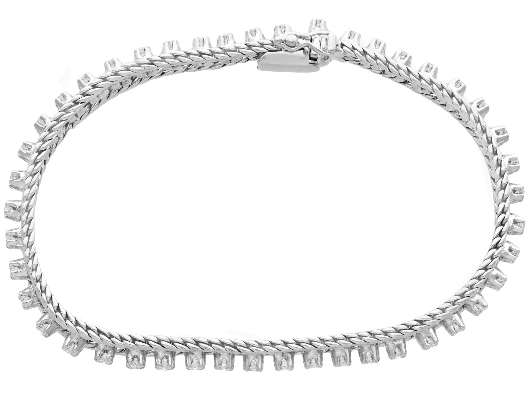 An impressive vintage 2.20 carat diamond, 18 karat white gold bracelet; part of our diverse gemstone bracelet collections

This fine and impressive vintage 1970s diamond bracelet has been crafted in 18k white gold.

The impressive setting of this