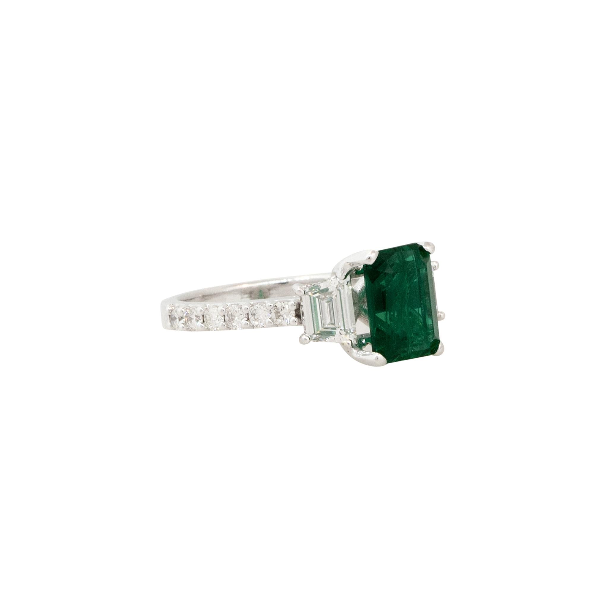 Emerald Cut 2.20 Carat Emerald and 0.72 Carat Diamond Side Stone Ring 18 Karat In Stock For Sale