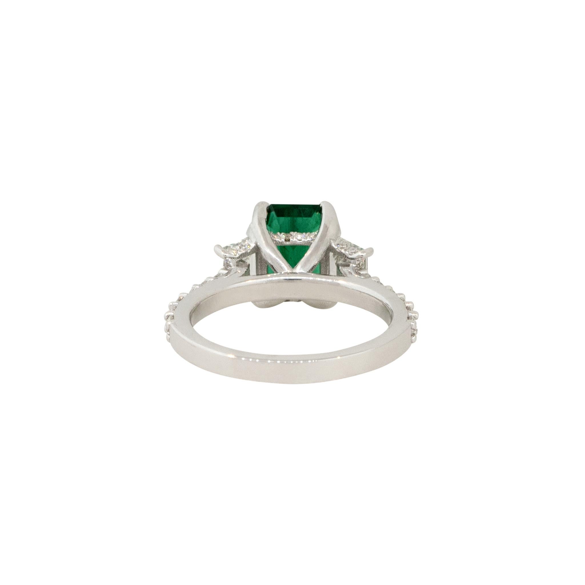 Women's 2.20 Carat Emerald and 0.72 Carat Diamond Side Stone Ring 18 Karat In Stock For Sale