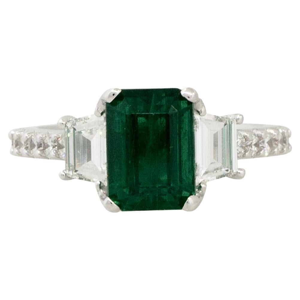 2.20 Carat Emerald and 0.72 Carat Diamond Side Stone Ring 18 Karat In Stock