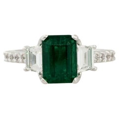 2.20 Carat Emerald and 0.72 Carat Diamond Side Stone Ring 18 Karat In Stock