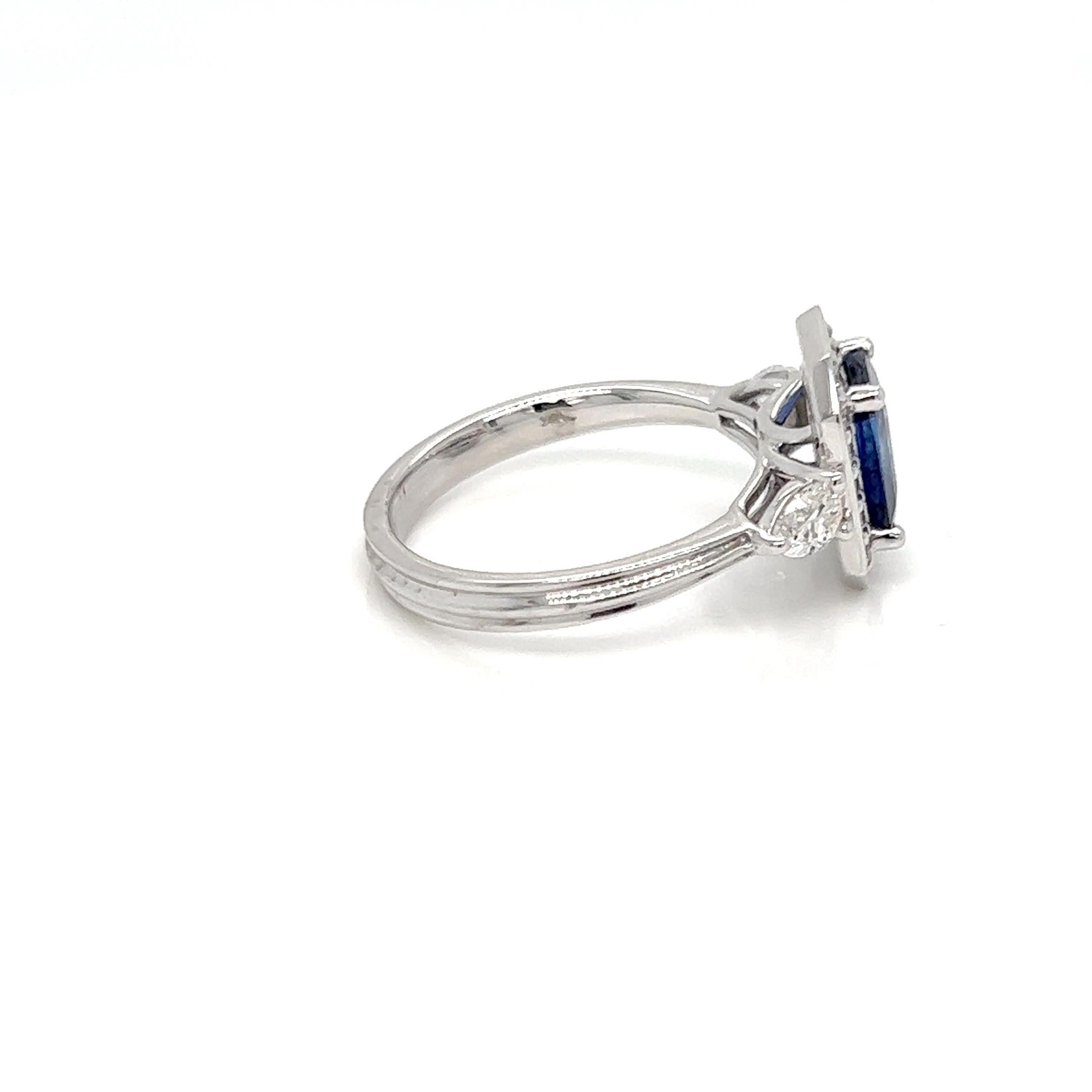 Emerald Cut 2.20 Carat Emerald cut Sapphire Diamond Halo Engagement Ring For Sale
