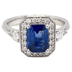 Used 2.20 Carat Emerald cut Sapphire Diamond Halo Engagement Ring