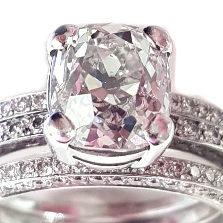 2.20ct European Old Cut Diamond With 2 Supporting Side Rings This set comprises 3 separate rings. The centre ring secures the 2.20ct old cut diamond in a cleverly made box setting allowing the two side rings to sit at either side.
The principal