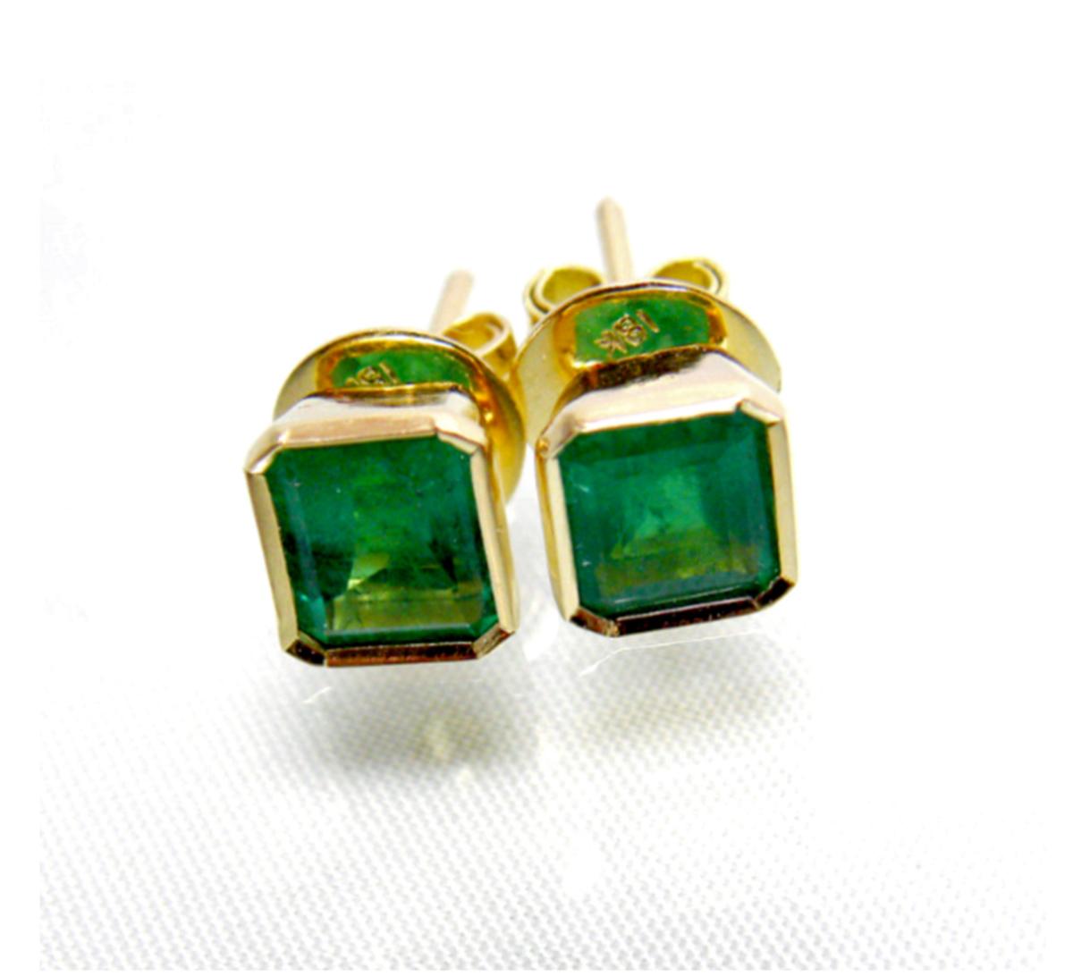 2.20 Carat Natural Emerald Stud Earrings 18k Yellow Gold
Primary Stones: 100% Natural Colombian Emerald 
Average Color/Clarity : Extraordinary Color AAA+ Medium Green/ Clarity, VS 
Total Weight Emeralds: Approx. 2.20 Carats 
Shape or Cut: Emerald