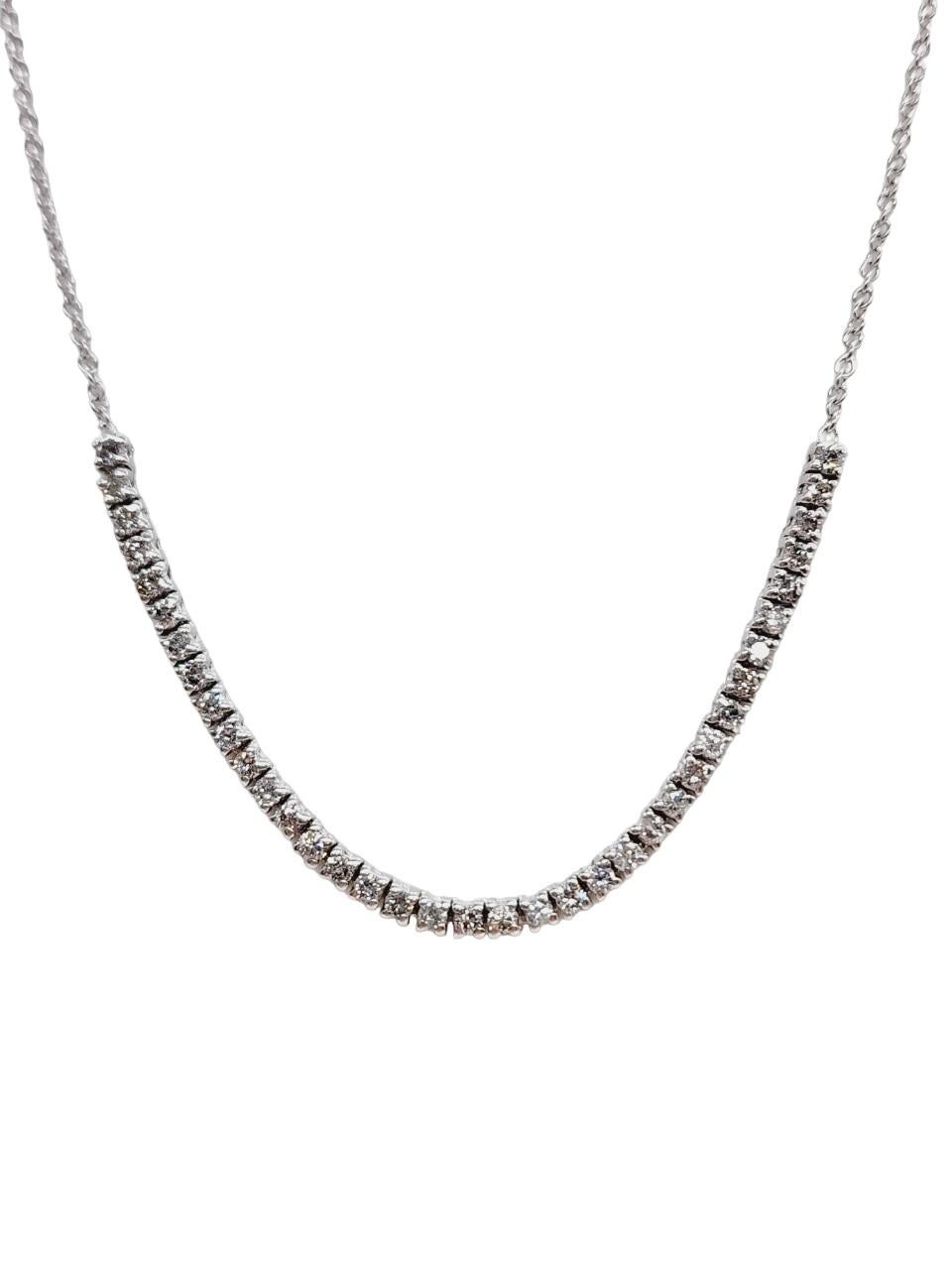 Brilliant and beautiful mini tennis necklace, natural round-brilliant cut white diamonds clean and Excellent shine.
14k white gold classic four-prong style for maximum light brilliance. 
24 inch length. Average G Color, SI Clarity. 