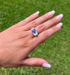 2.20 Carat Oval Cut Tanzanite Half Bezel Bow Ring in 18K White Gold Ring