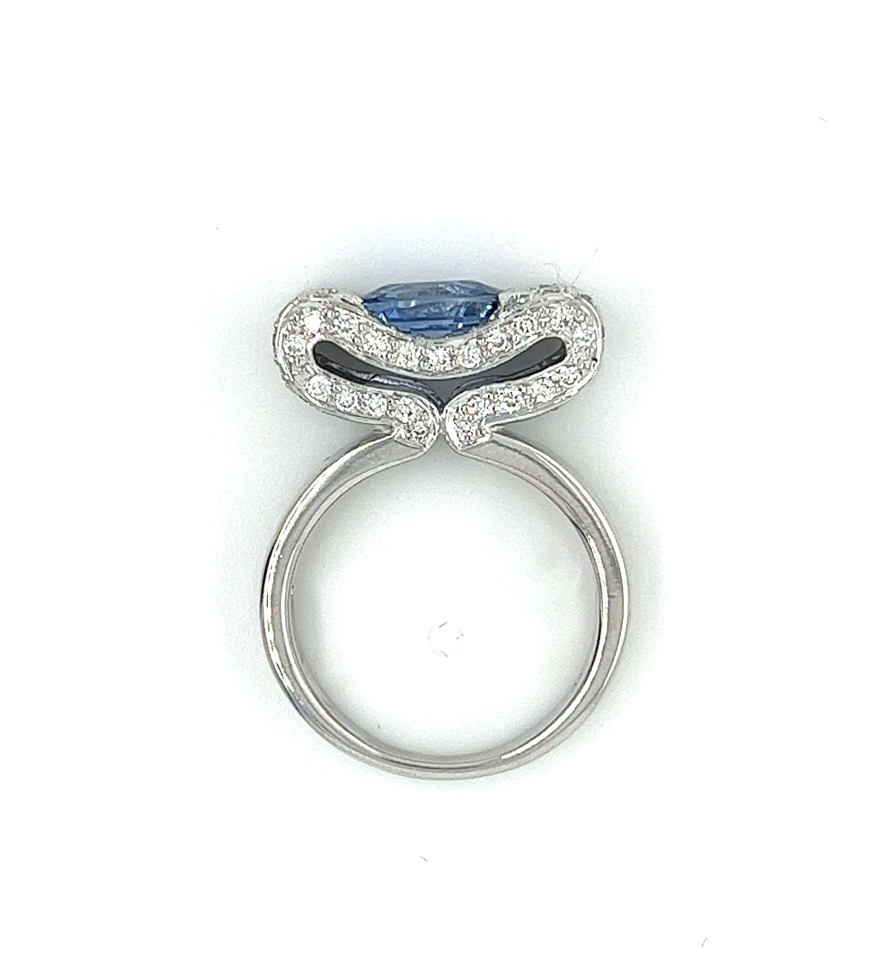 2.20 Carat Oval Cut Tanzanite Half Bezel Bow Ring in 18K White Gold Ring  For Sale 1