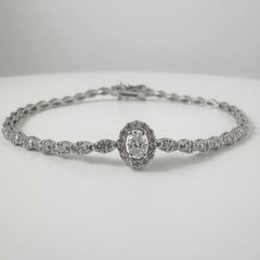 2.20 Carat Oval Diamond Halo Center Bracelet in 14K Yellow Gold, 7 Inches