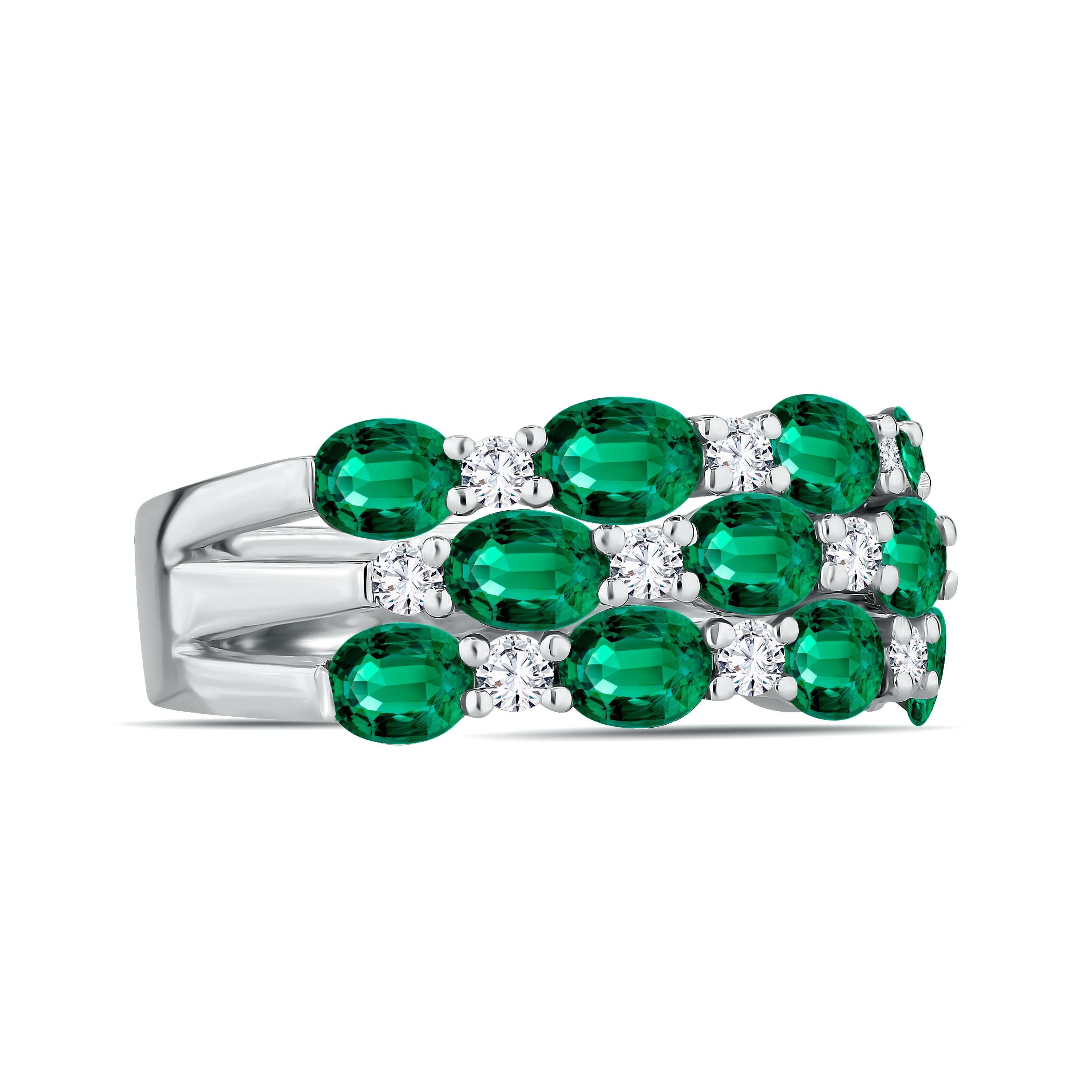 Presenting an absolute marvel in jewelry—a ring that embodies elegance, sophistication, and sheer beauty! This exquisite piece is a testament to fine craftsmanship and timeless allure.

Behold the allure of the oval-cut emeralds, meticulously