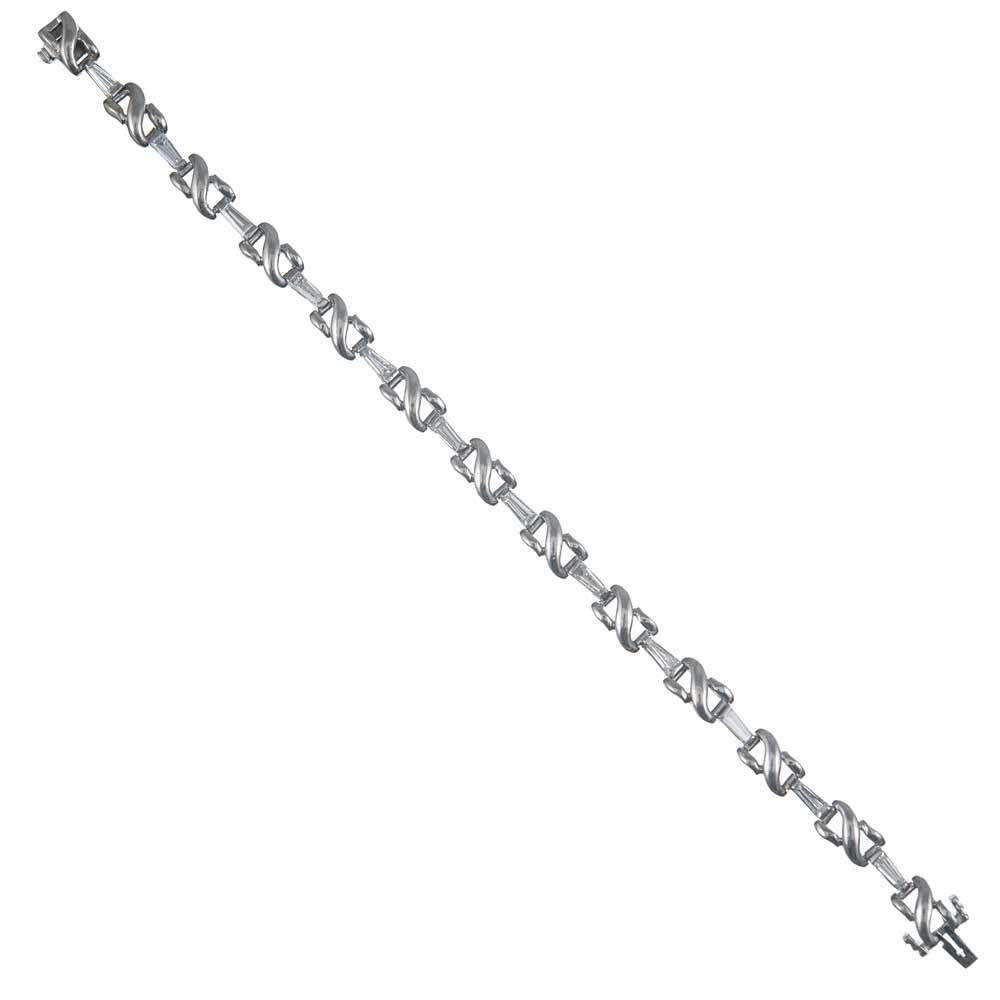 A unique and artistic creation, designed as a row of 18 karat white gold knots intersected by tapered baguette diamonds. The bracelet measures 7 inches long and is signed & numbered by Kurt Wayne. The diamonds weigh 2.20 carats in total and exhibit