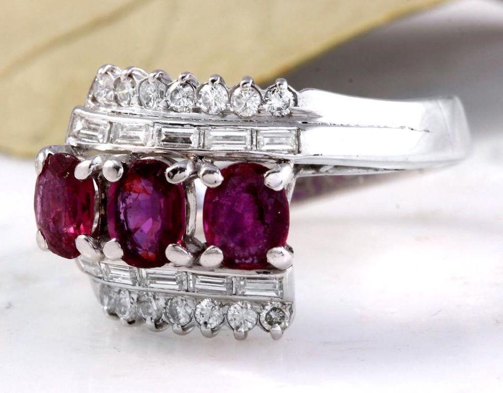 2.20 Carats Impressive Natural Red Ruby and Diamond 18K Solid White Gold Ring

Total Red Rubies Weight is: 1.62 Carats (transparent)

Natural Round & Baguette Diamonds Weight is: .58 Carats (color F-G / Clarity VS1-SI1)

The width of the ring is: