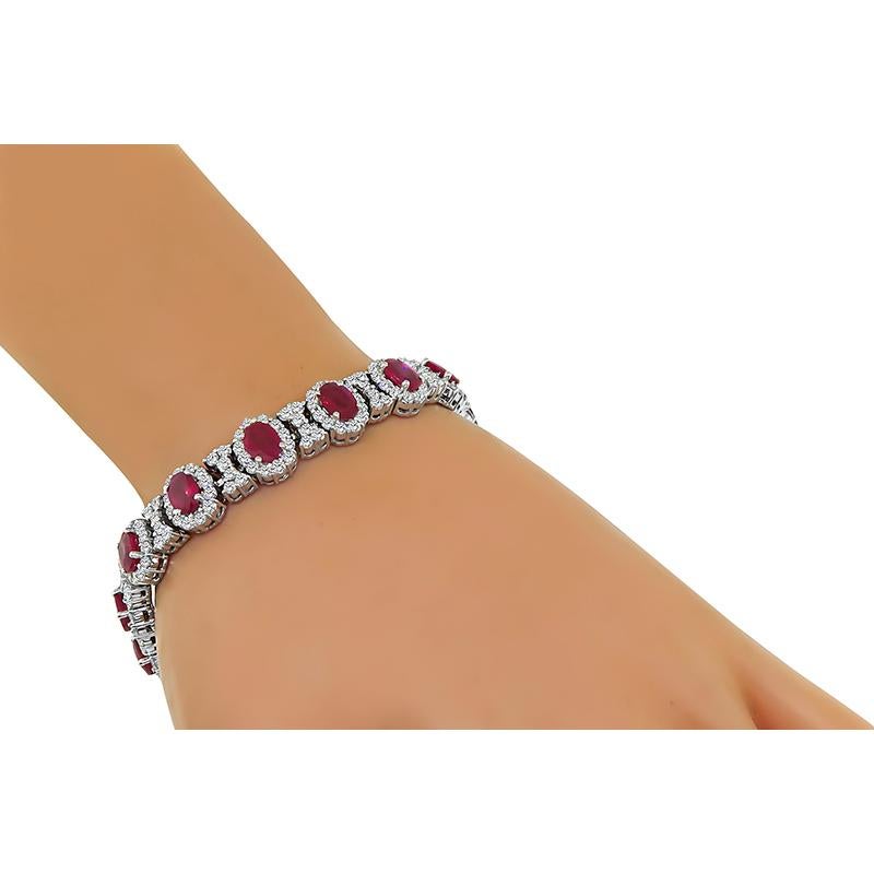 This is a fabulous 18k white gold bracelet. The bracelet is set with lovely oval cut Burma rubies that weigh approximately 22.00ct. The rubies are accentuated by sparkling round cut diamonds that weigh approximately 8.00ct. The color of these