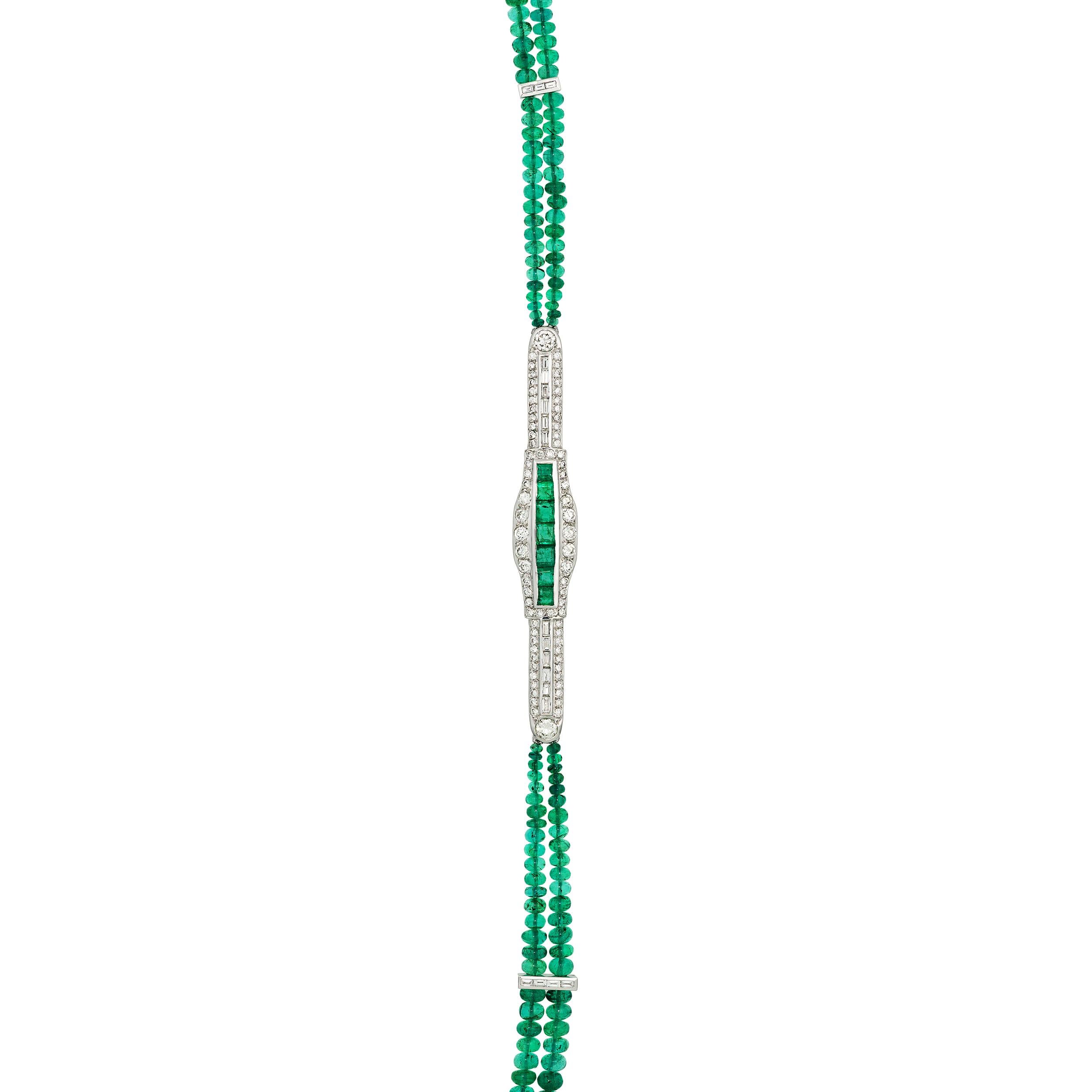 This long and sleek necklace is as striking as it is comfortable.  The designer happened across a vintage treasure made with 2.3 Carats of Precision Set Emeralds and surrounded with 2.66 Carats of Round Brilliant and Baguette Diamonds.  The lines of