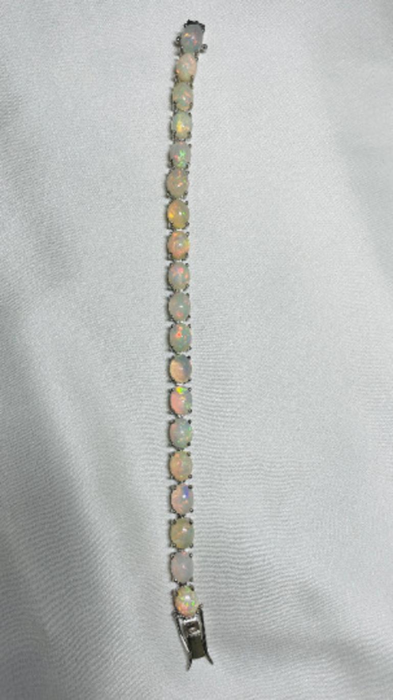 Women's 22.04 Carat Genuine Ethiopian Fire Opal Tennis Bracelet in Sterling Silver For Sale