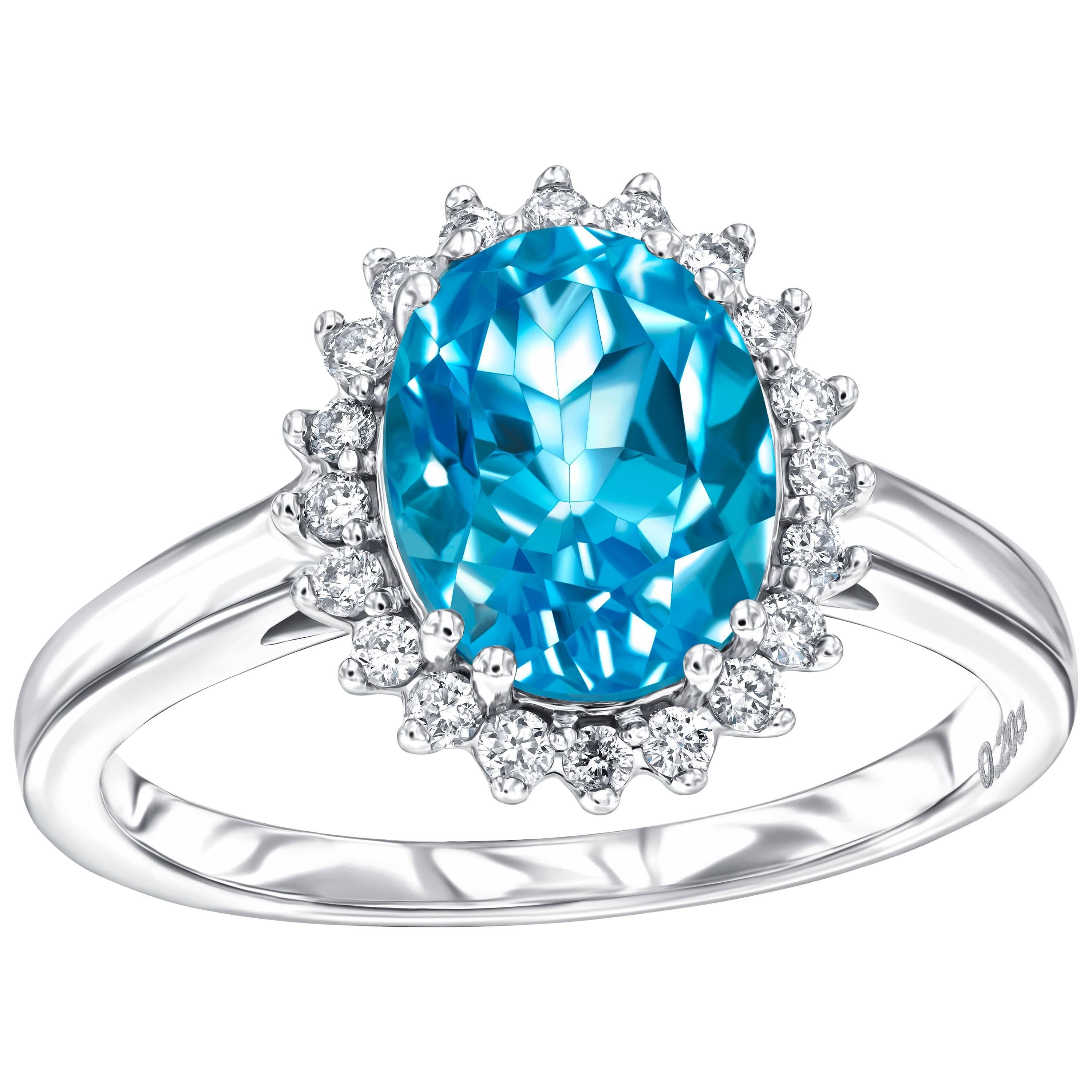 2.20ct Oval Cut Blue Topaz 0.20ct Round Diamond White Gold Engagement Ring