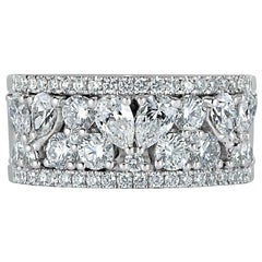 Anillo de oro blanco de 18 quilates con diamantes talla brillante redondos y pera de 2,20 quilates